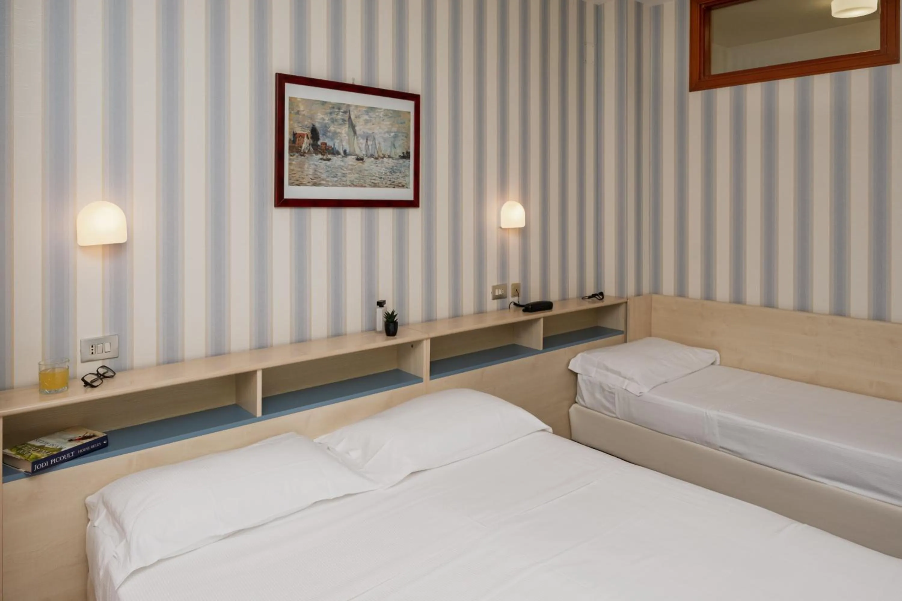 Bed in Hotel Riviera