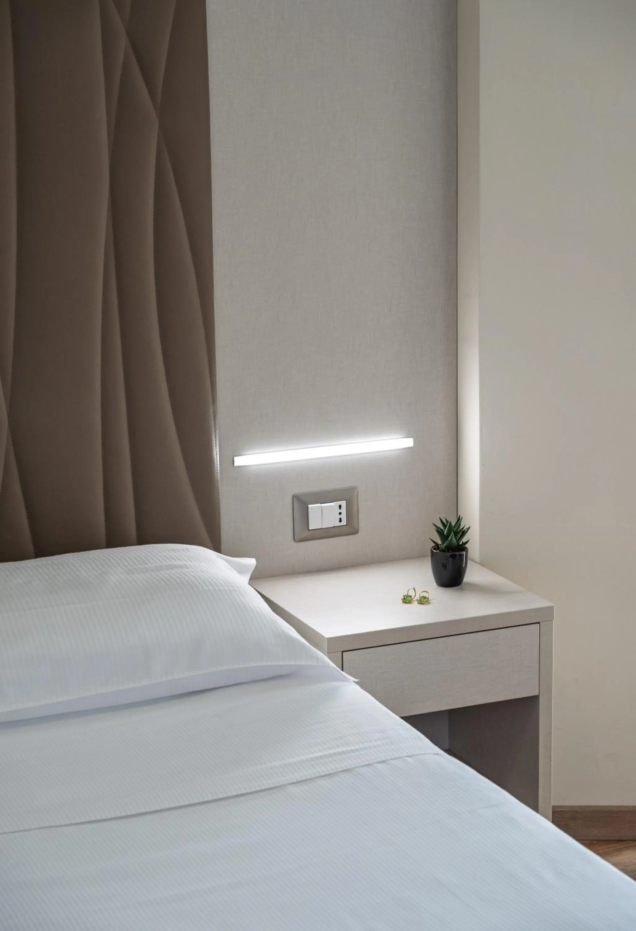 Bed in Hotel Riviera