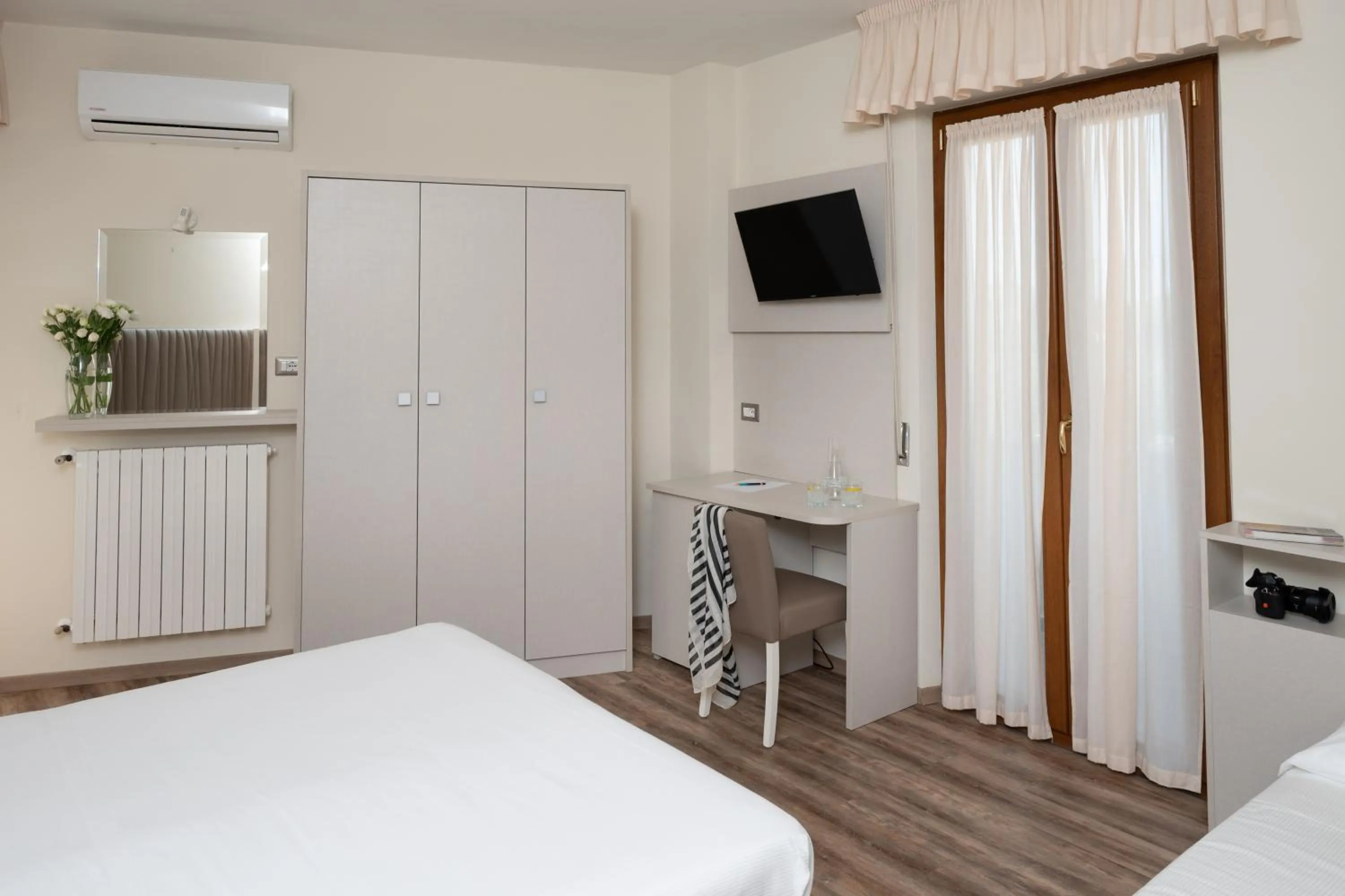 Bed in Hotel Riviera