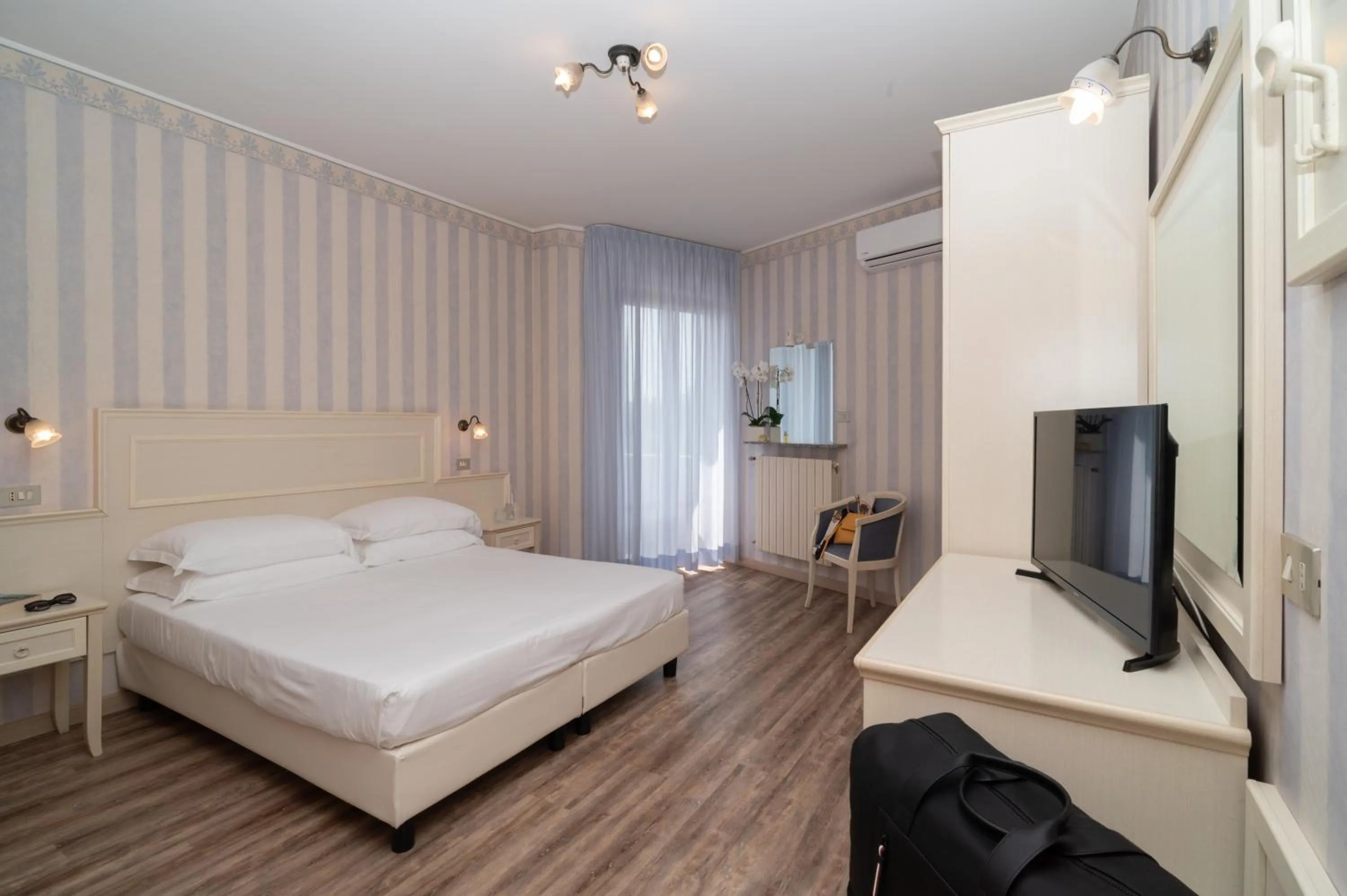 Bed in Hotel Riviera