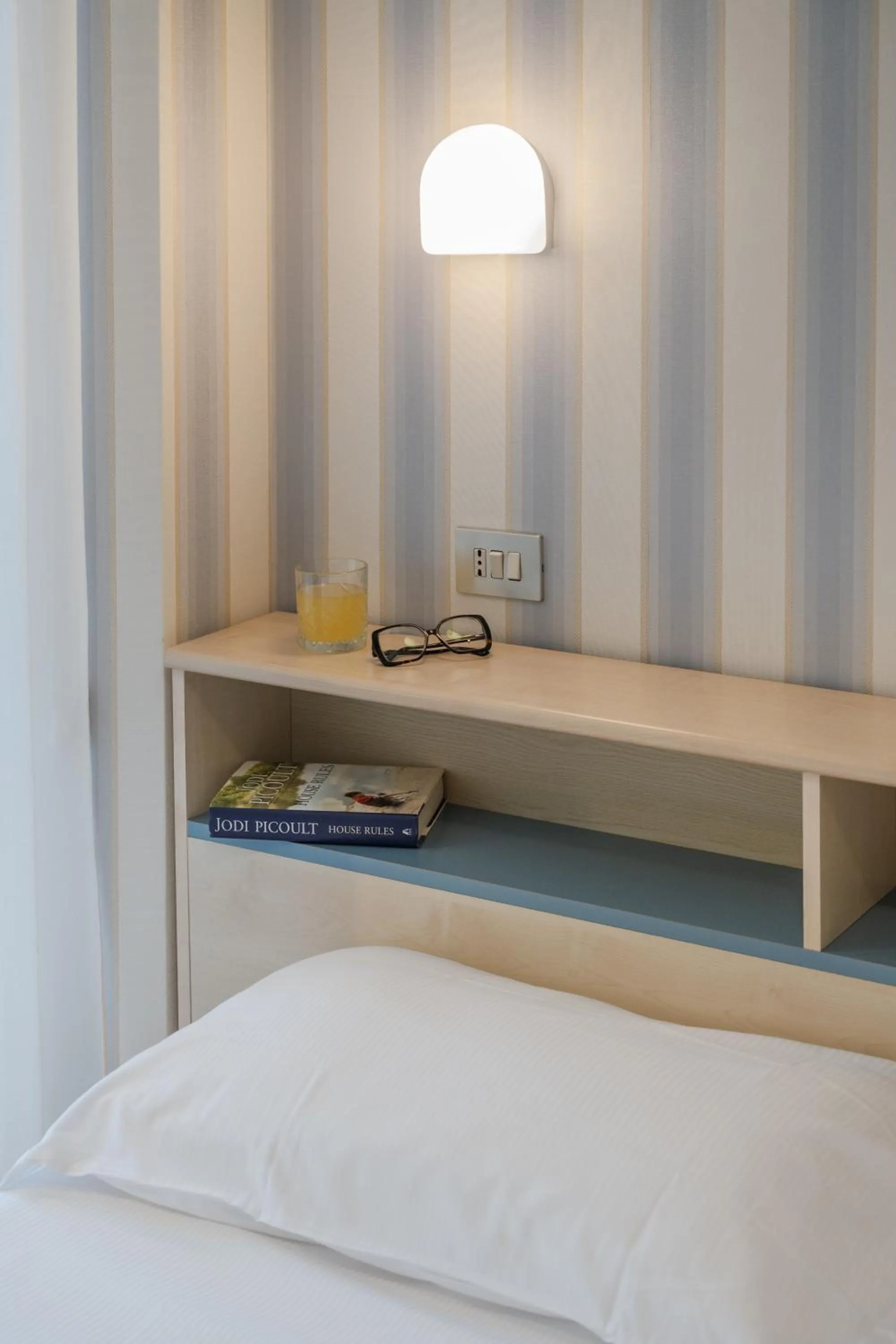 Bed in Hotel Riviera