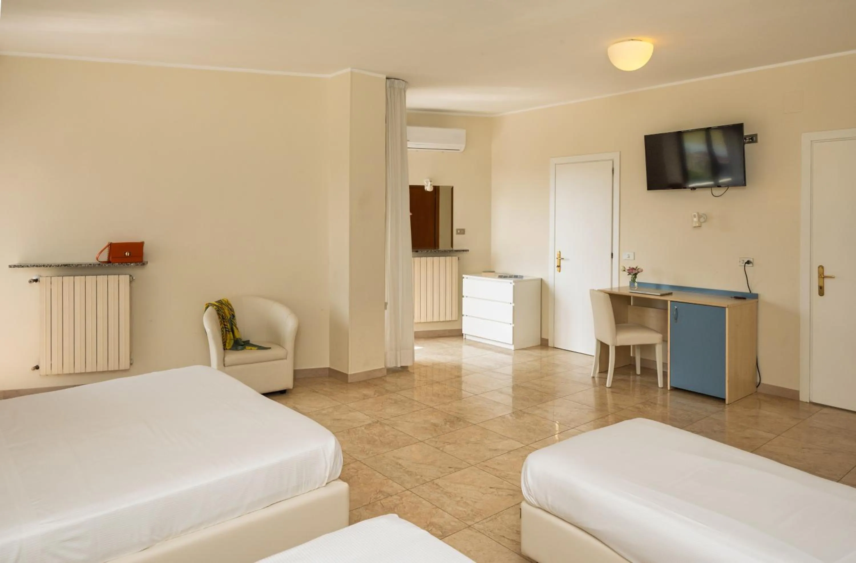 Bed in Hotel Riviera