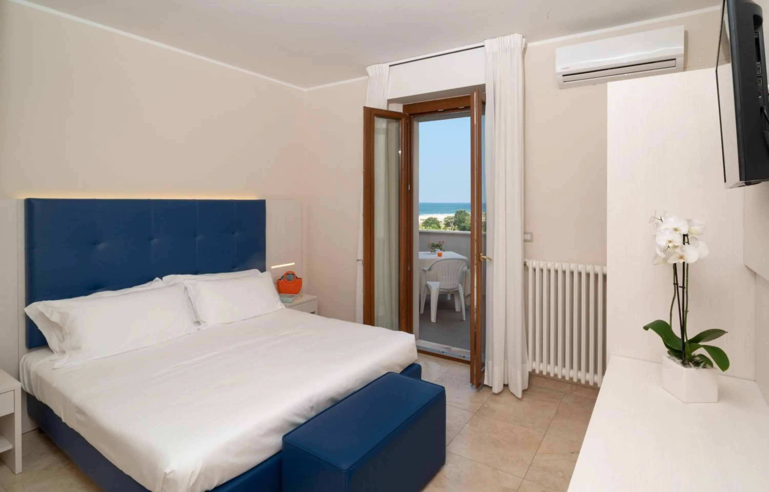 Bed in Hotel Riviera