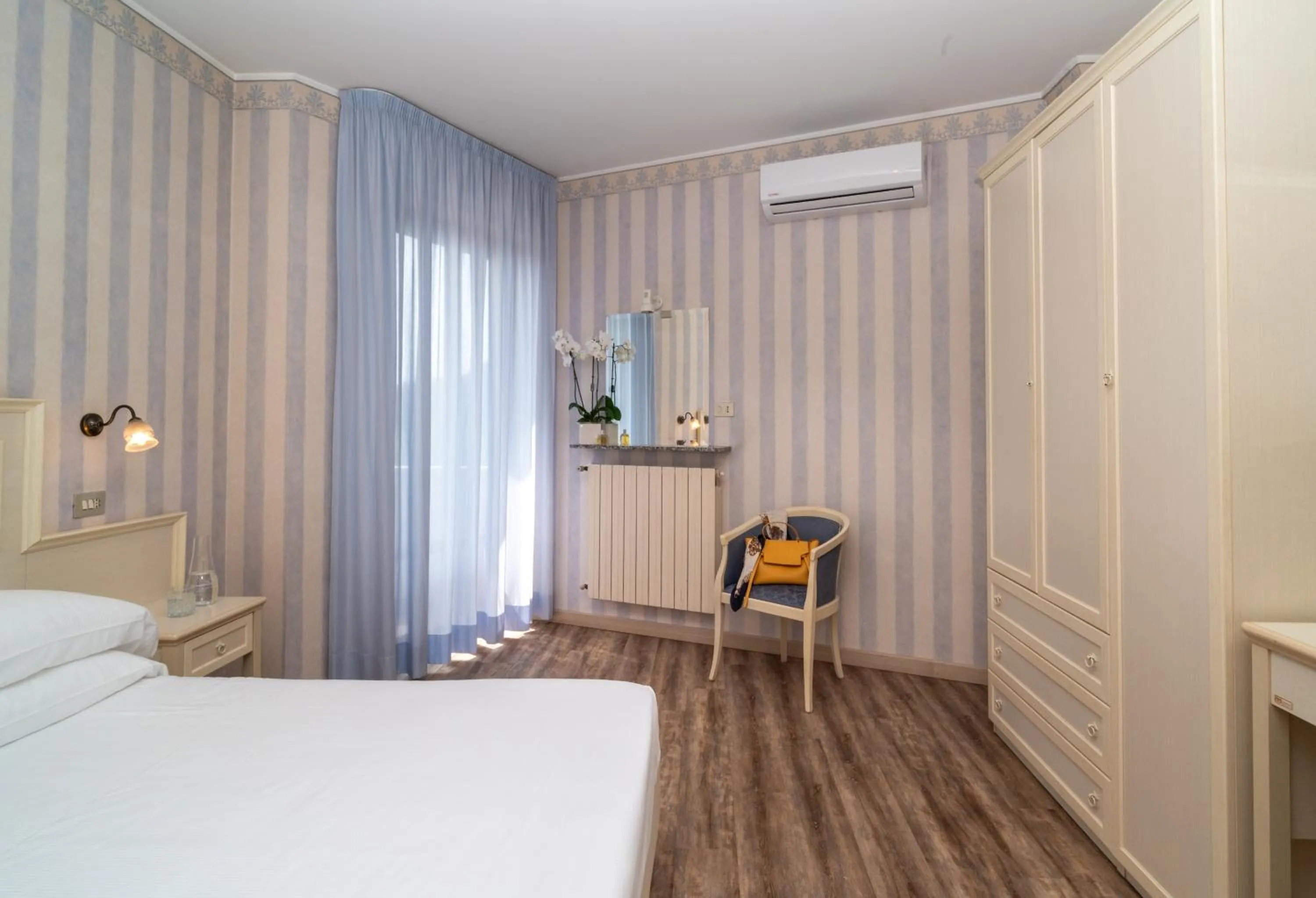 Bed in Hotel Riviera