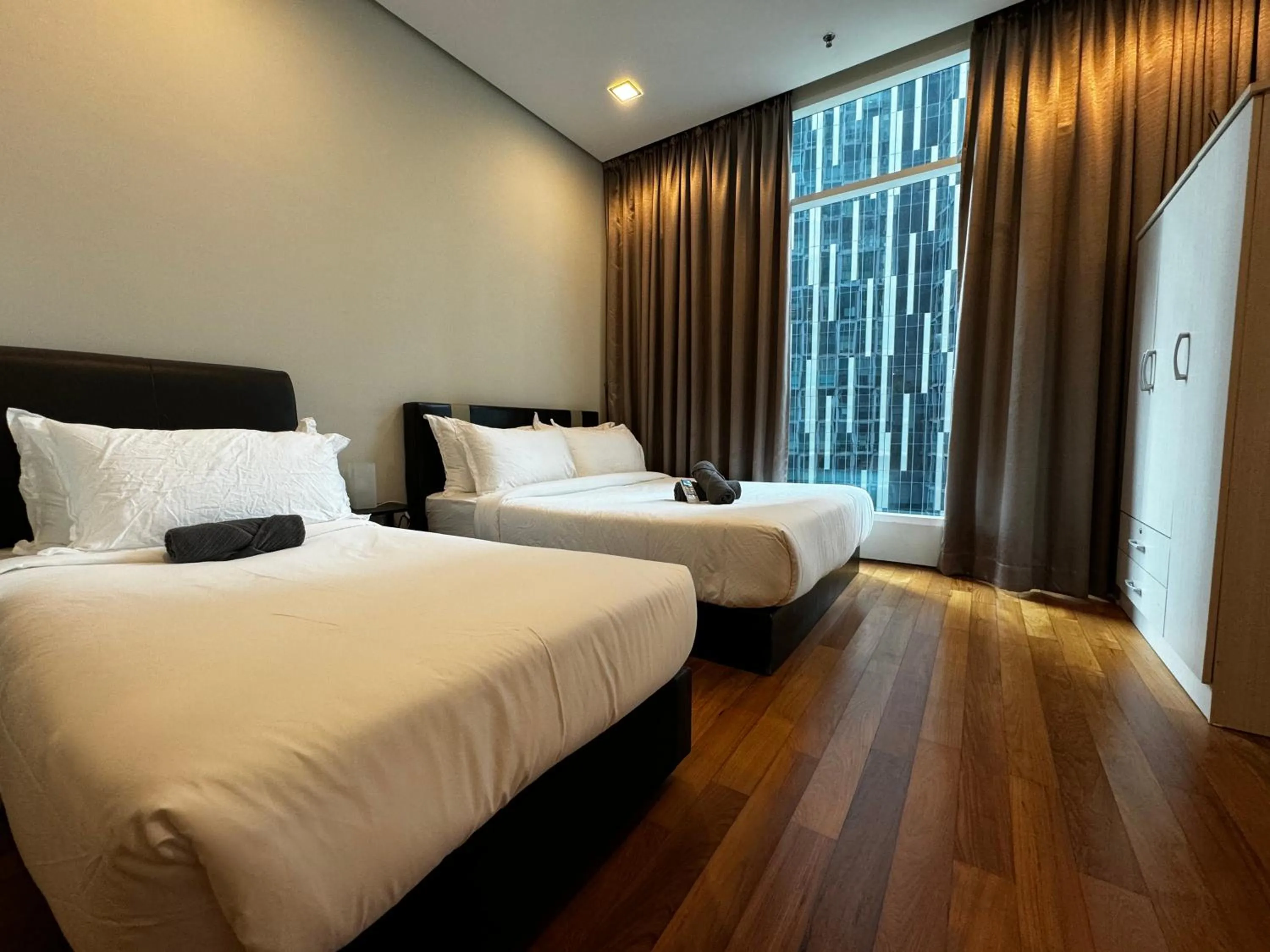 Bed in Soho Suites KLCC by Alucard's Cat