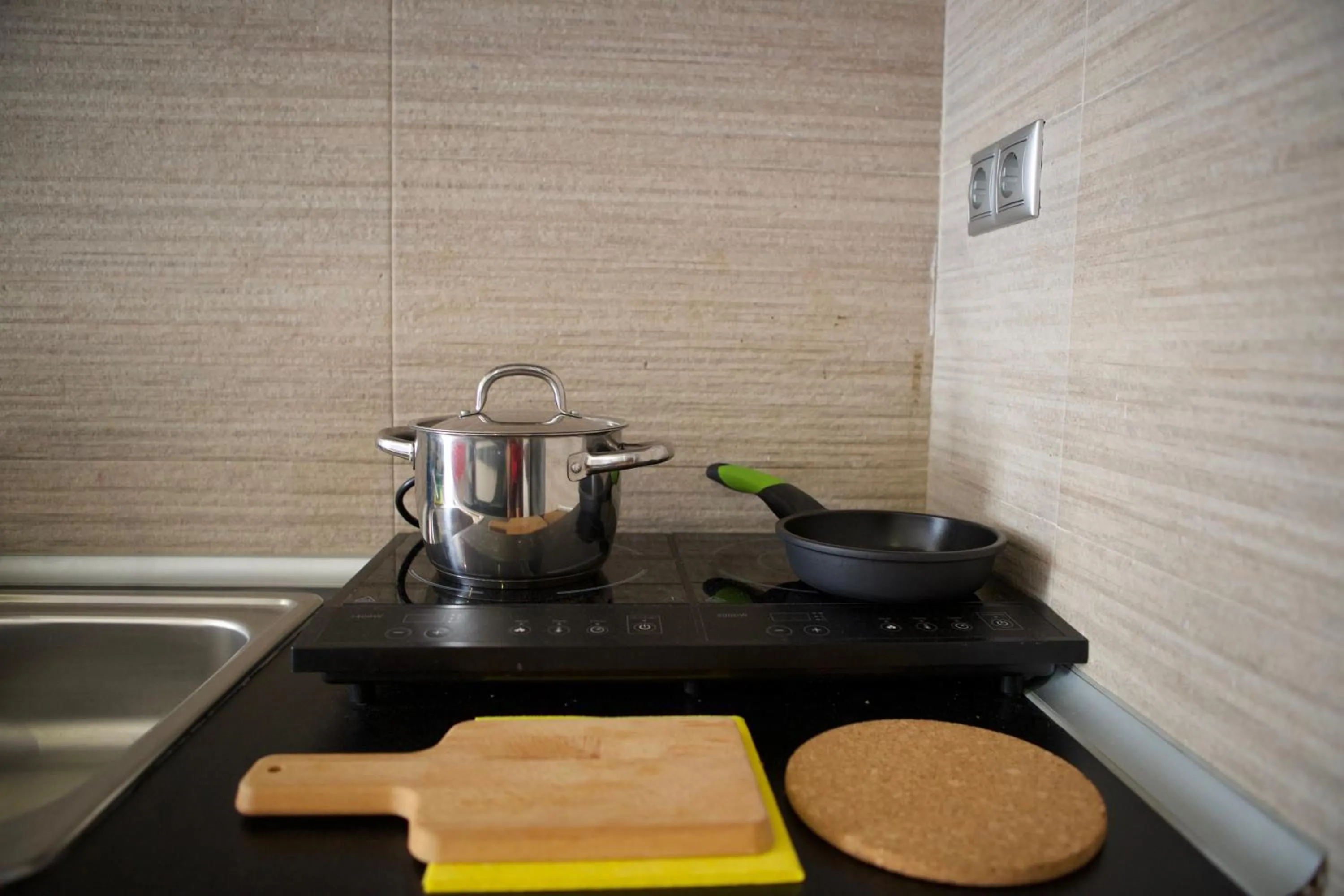Kitchen or kitchenette in Concept Suites