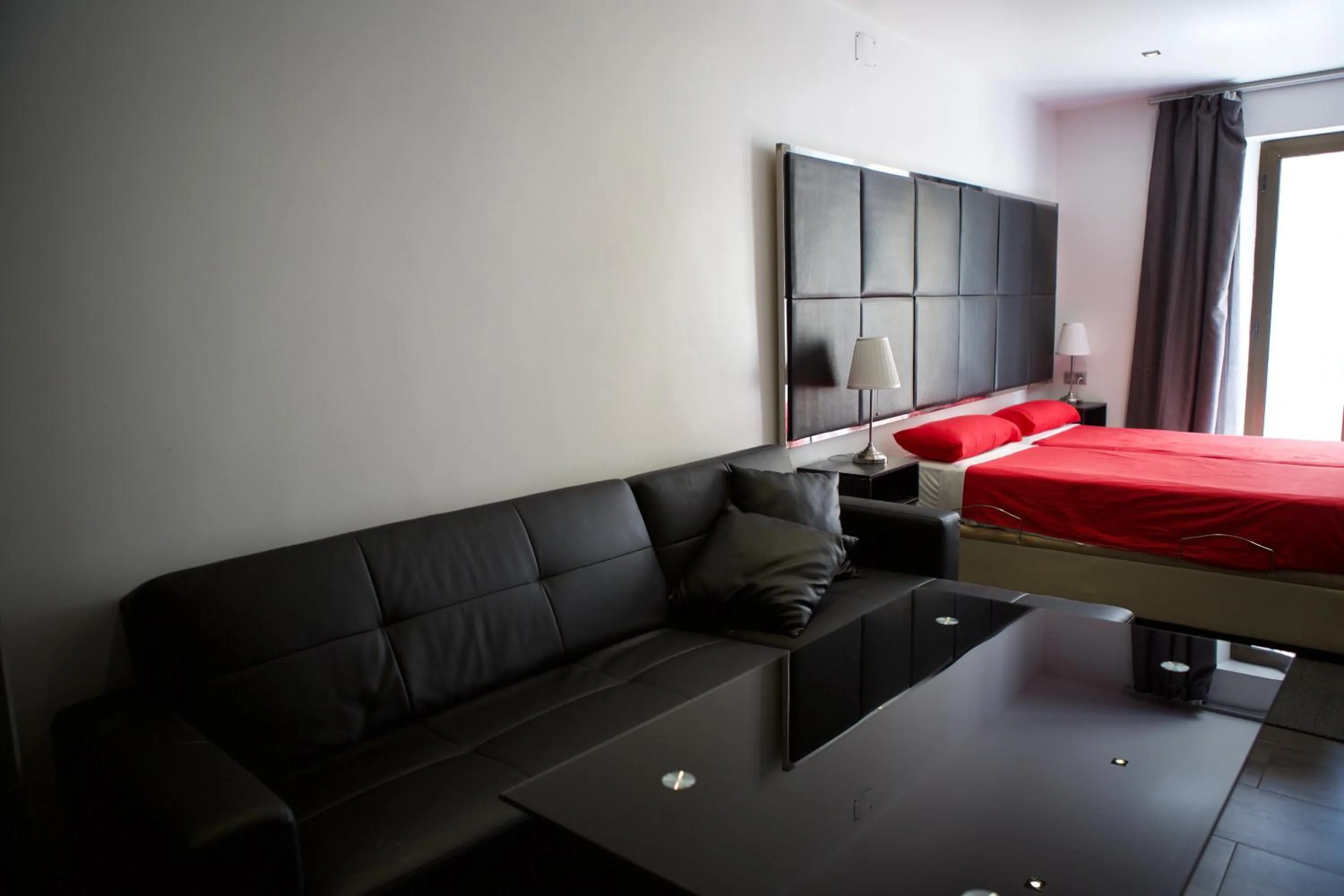 Living room, Bed in Concept Suites
