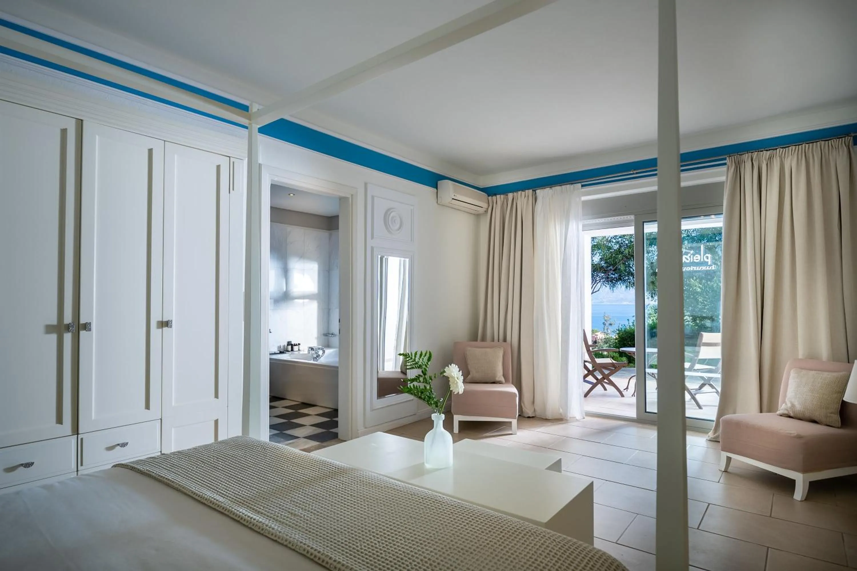 Bedroom in Pleiades Luxurious Villas
