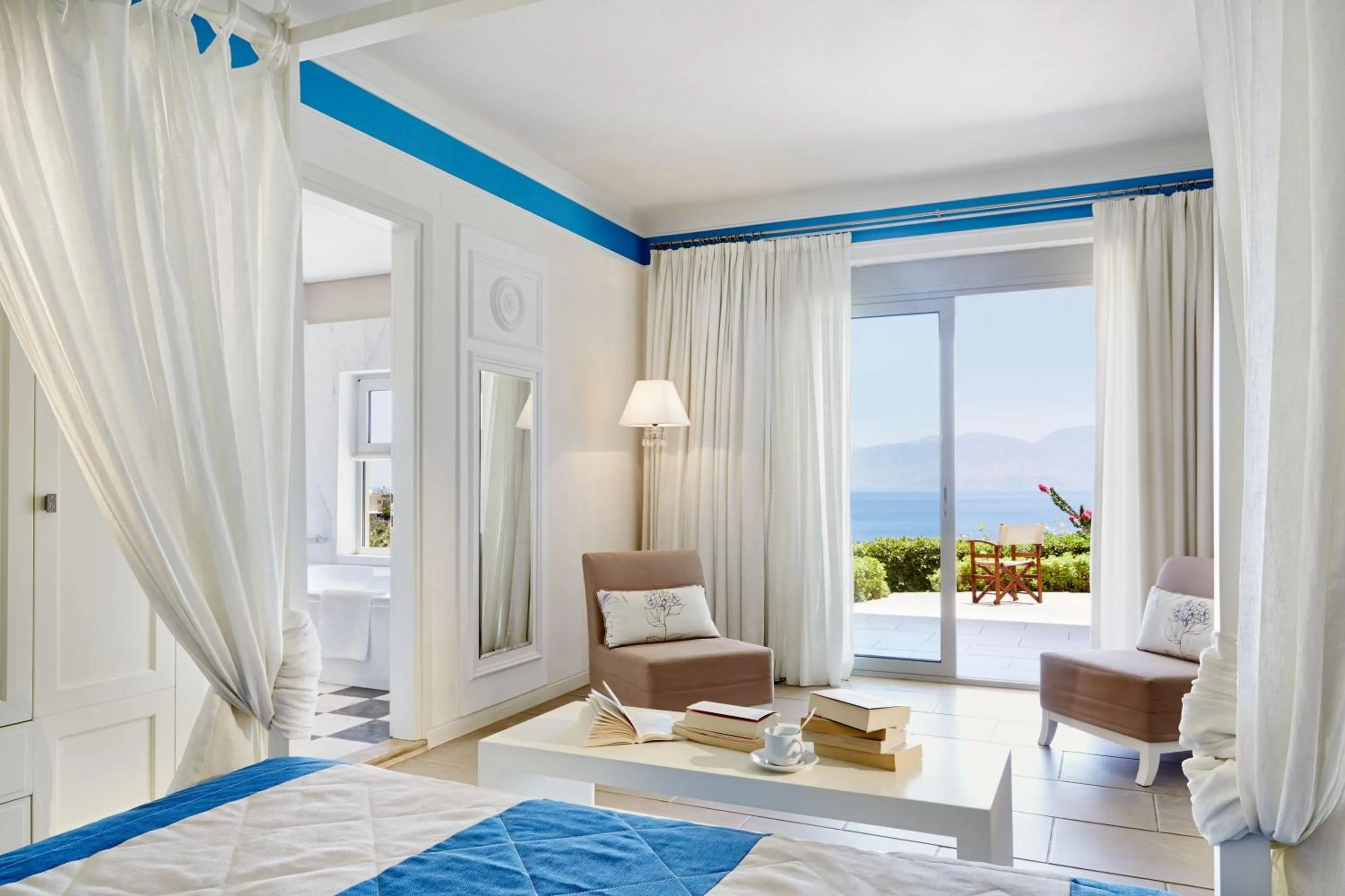 Bedroom in Pleiades Luxurious Villas