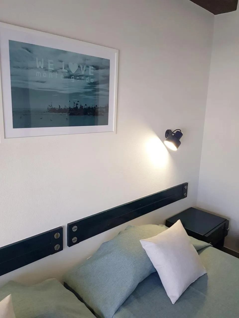 Bed in Apartamentos Guadiana