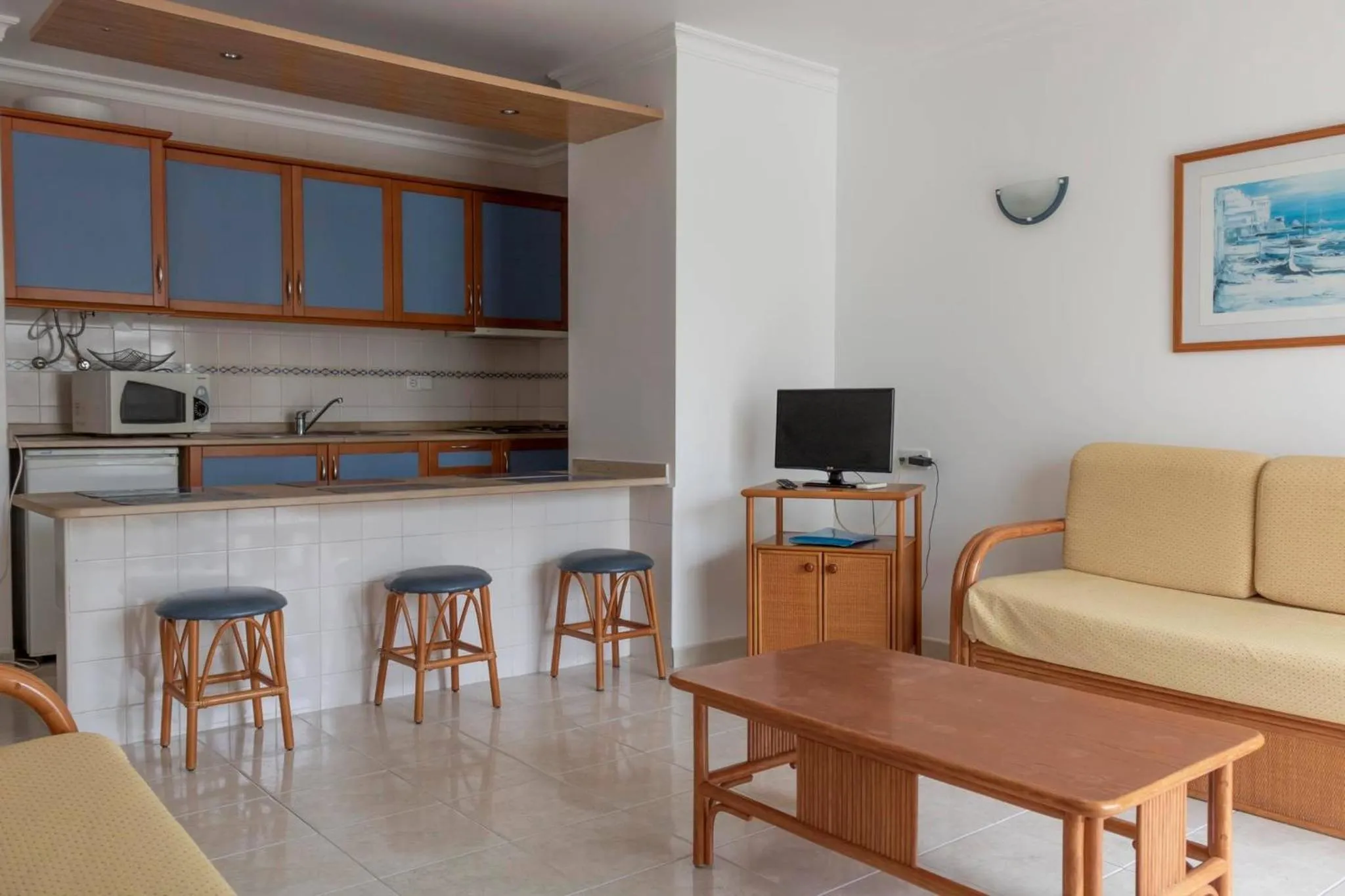 Kitchen or kitchenette in Aparthotel Calema Avenida Jardim