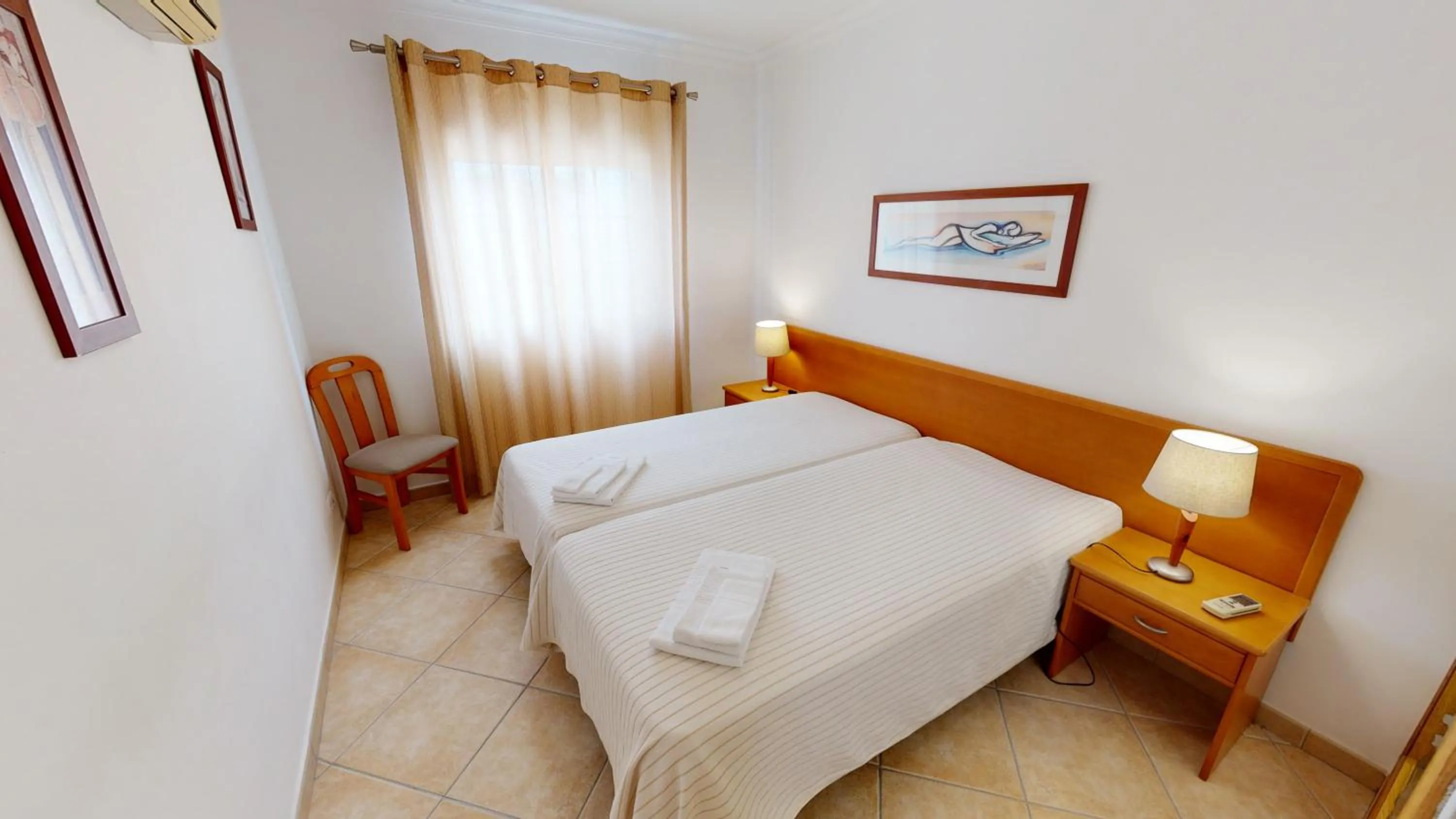 Bedroom, Bed in Praia da Lota Beachfront Resort - Hotel & Apartments