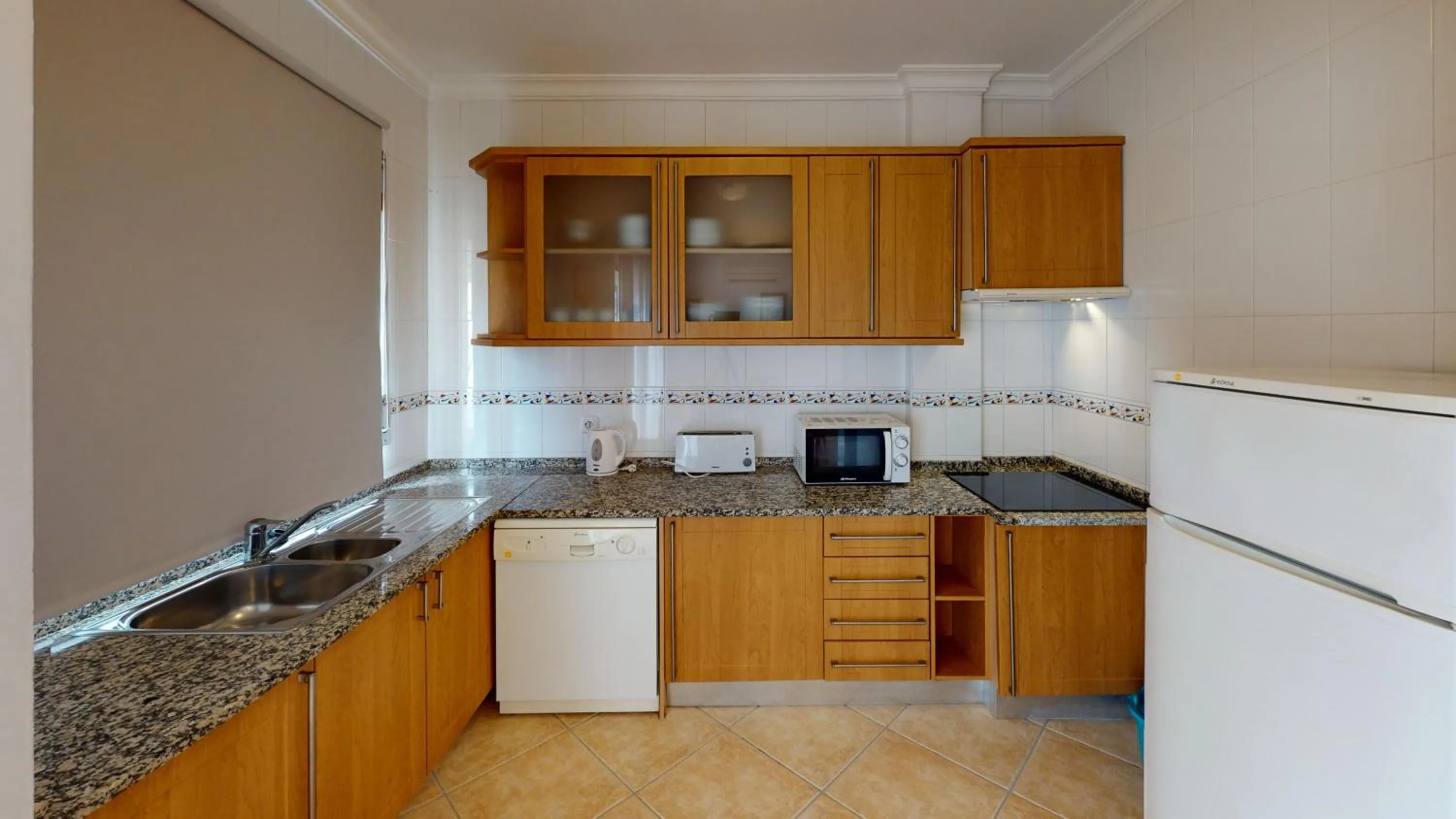 Kitchen or kitchenette in Praia da Lota Beachfront Resort - Hotel & Apartments