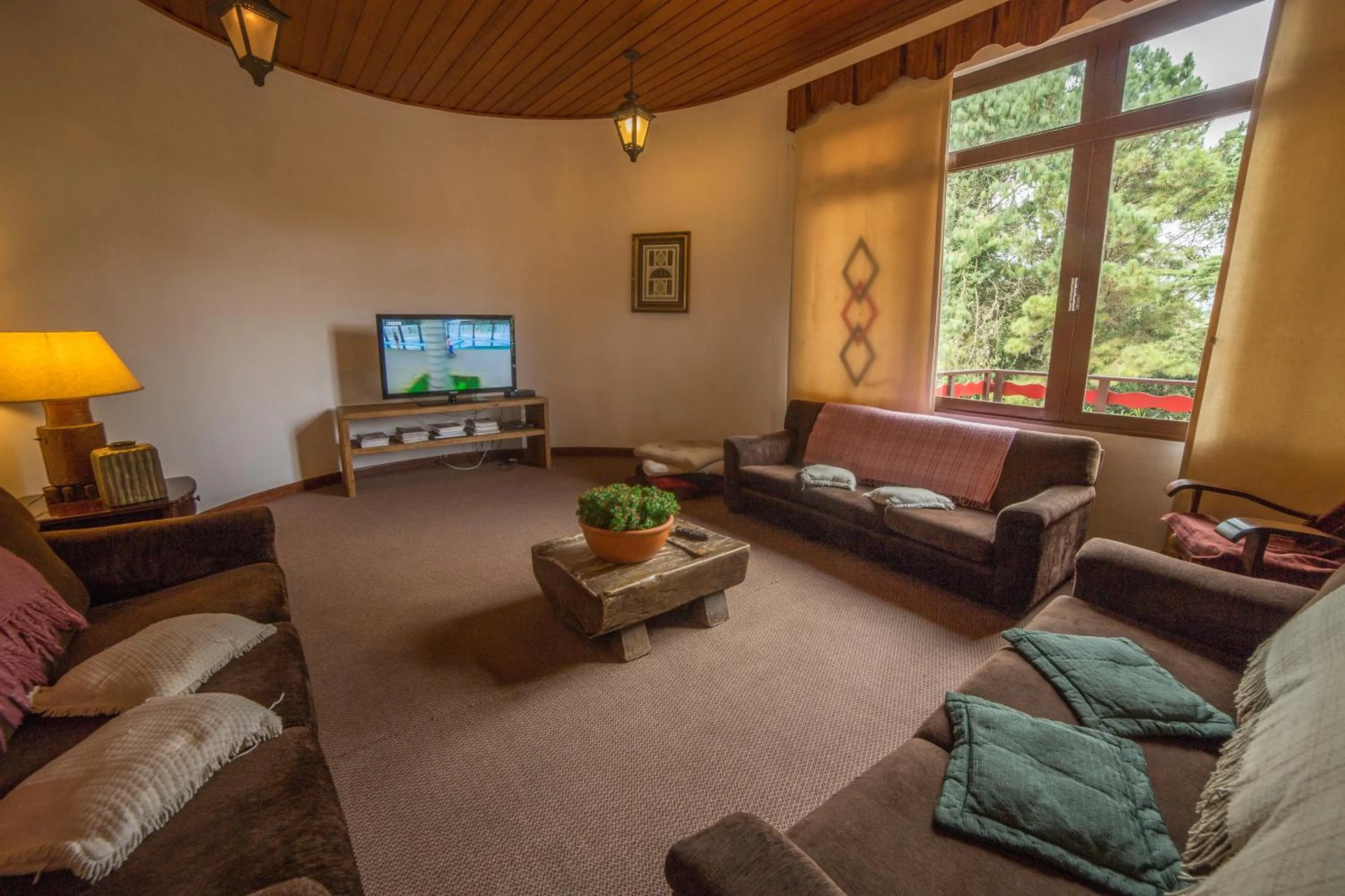 Communal lounge/ TV room in Hotel Recanto São Cristóvão - Próximo ao parque Tarundu