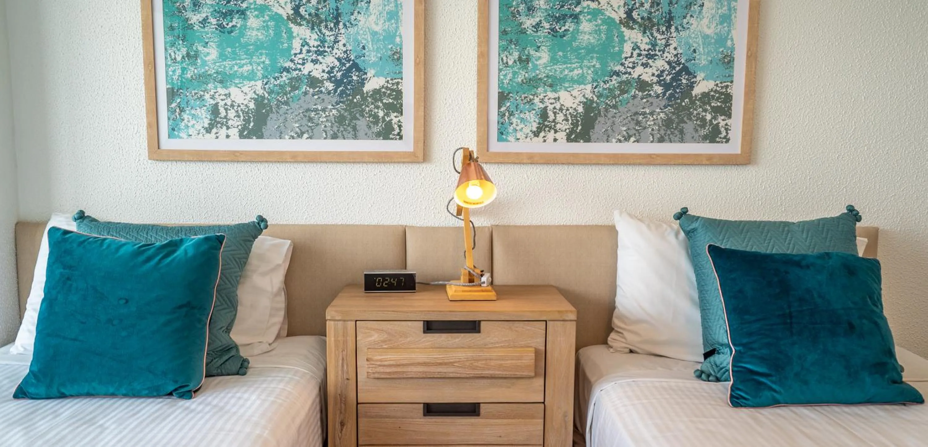 Bed in Mandolin Beachfront Resort