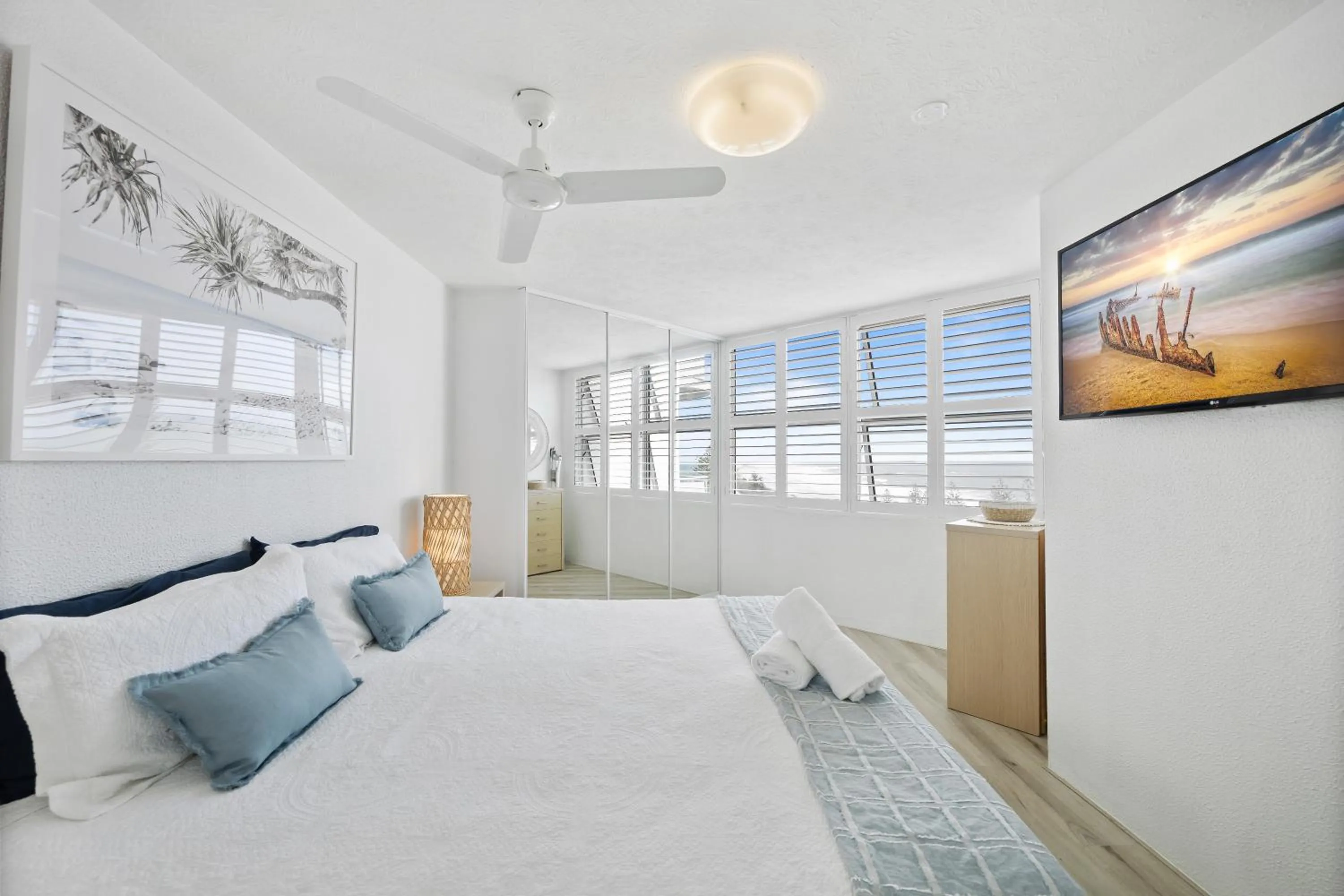 Bed in Mandolin Beachfront Resort