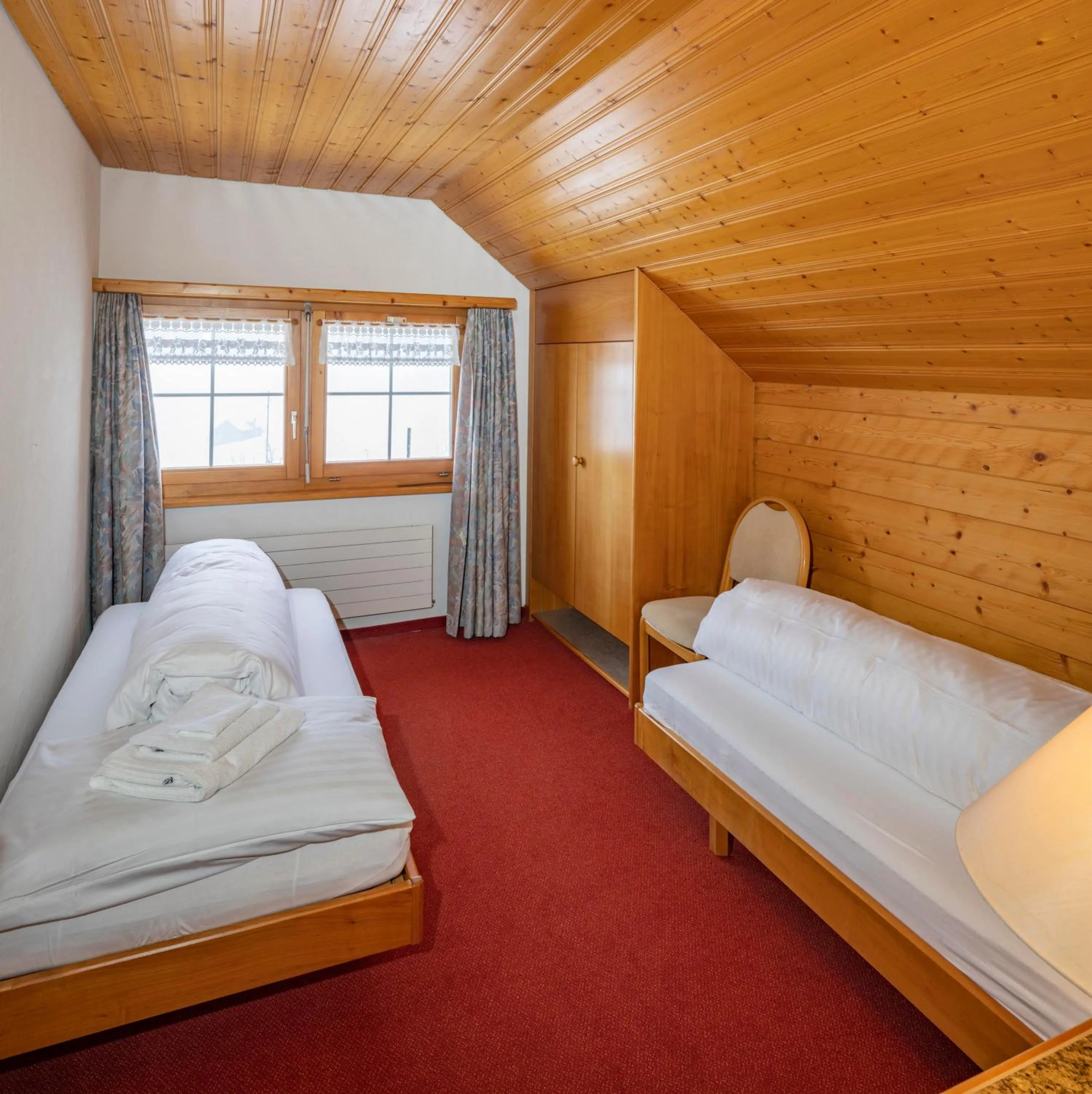 Photo of the whole room, Bed in Hotel und Restaurant Chäseren