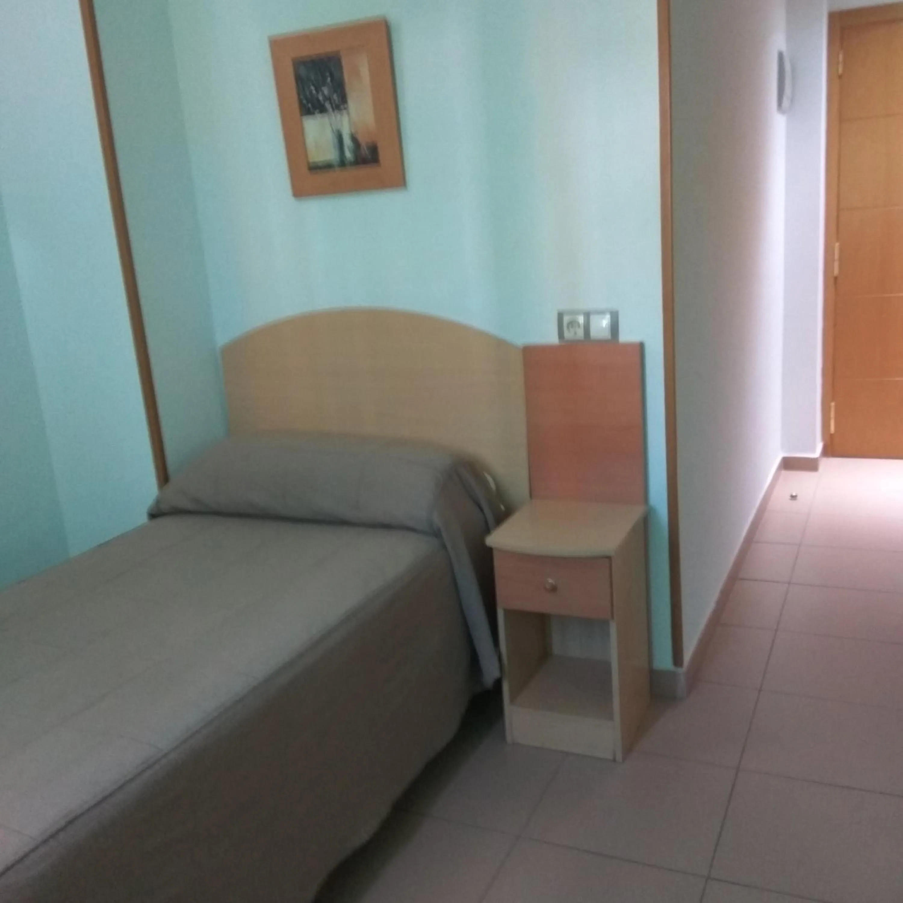 Bed in Hostal El Arco