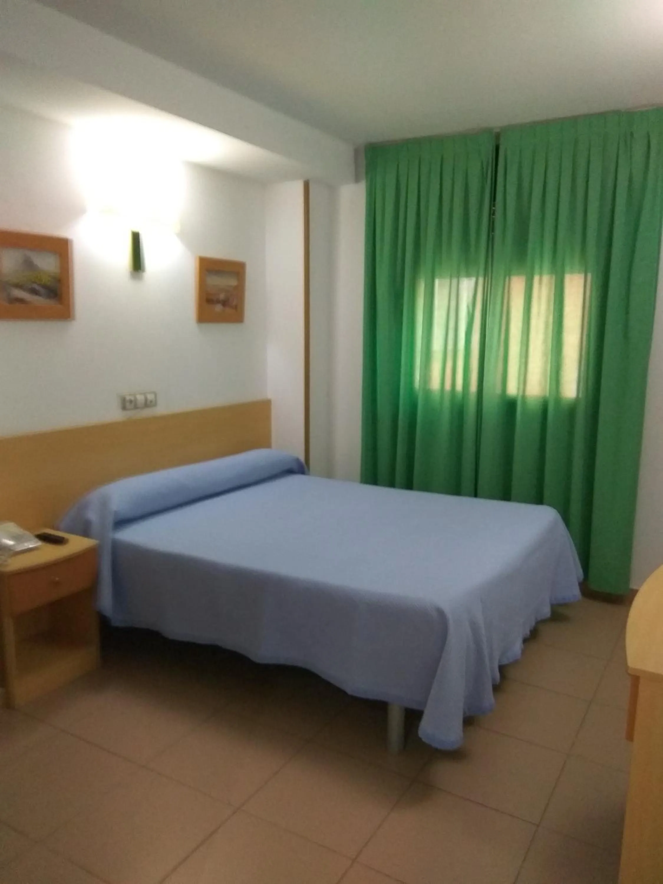 Bed in Hostal El Arco