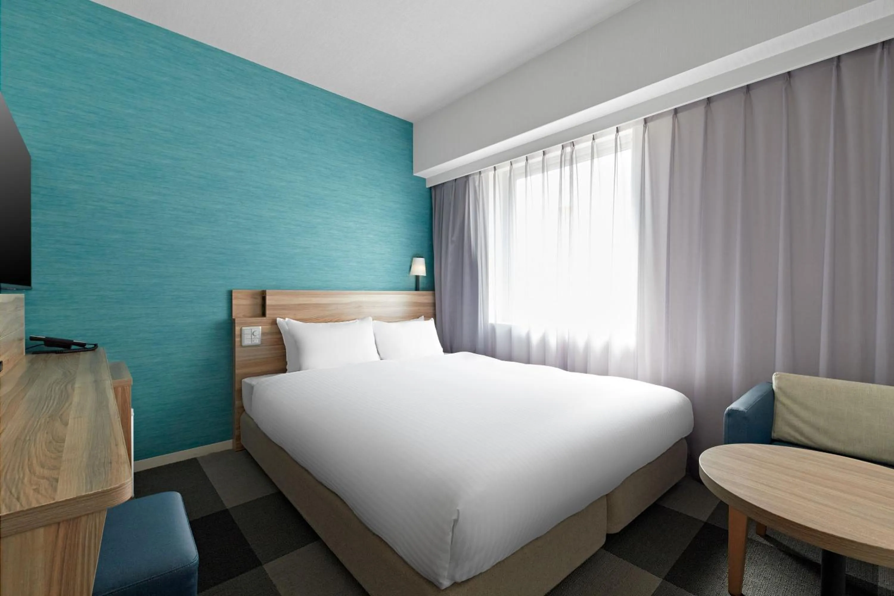 Bed in Sotetsu Fresa Inn Osaka Shinsaibashi