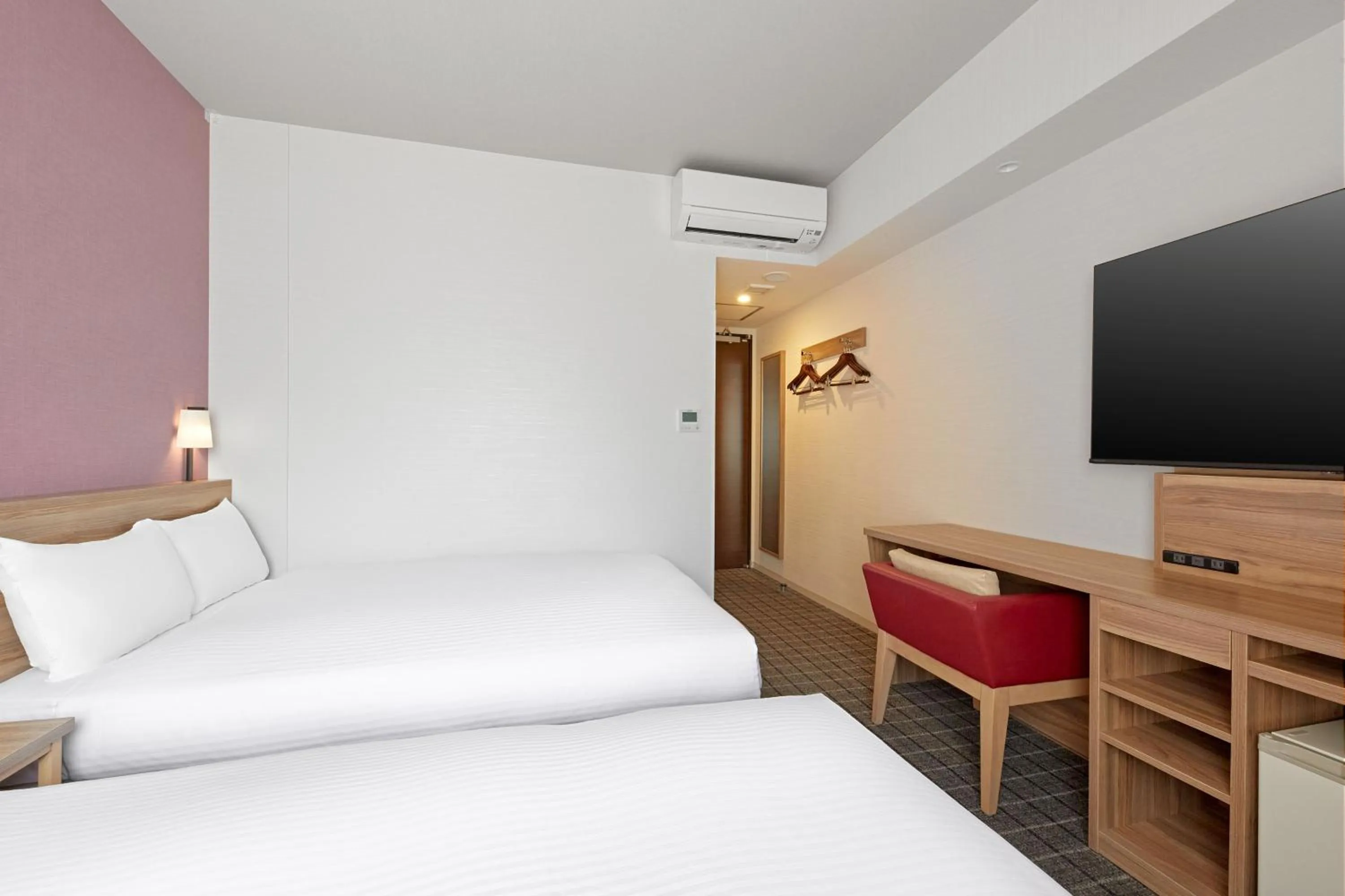 Bed in Sotetsu Fresa Inn Osaka Shinsaibashi