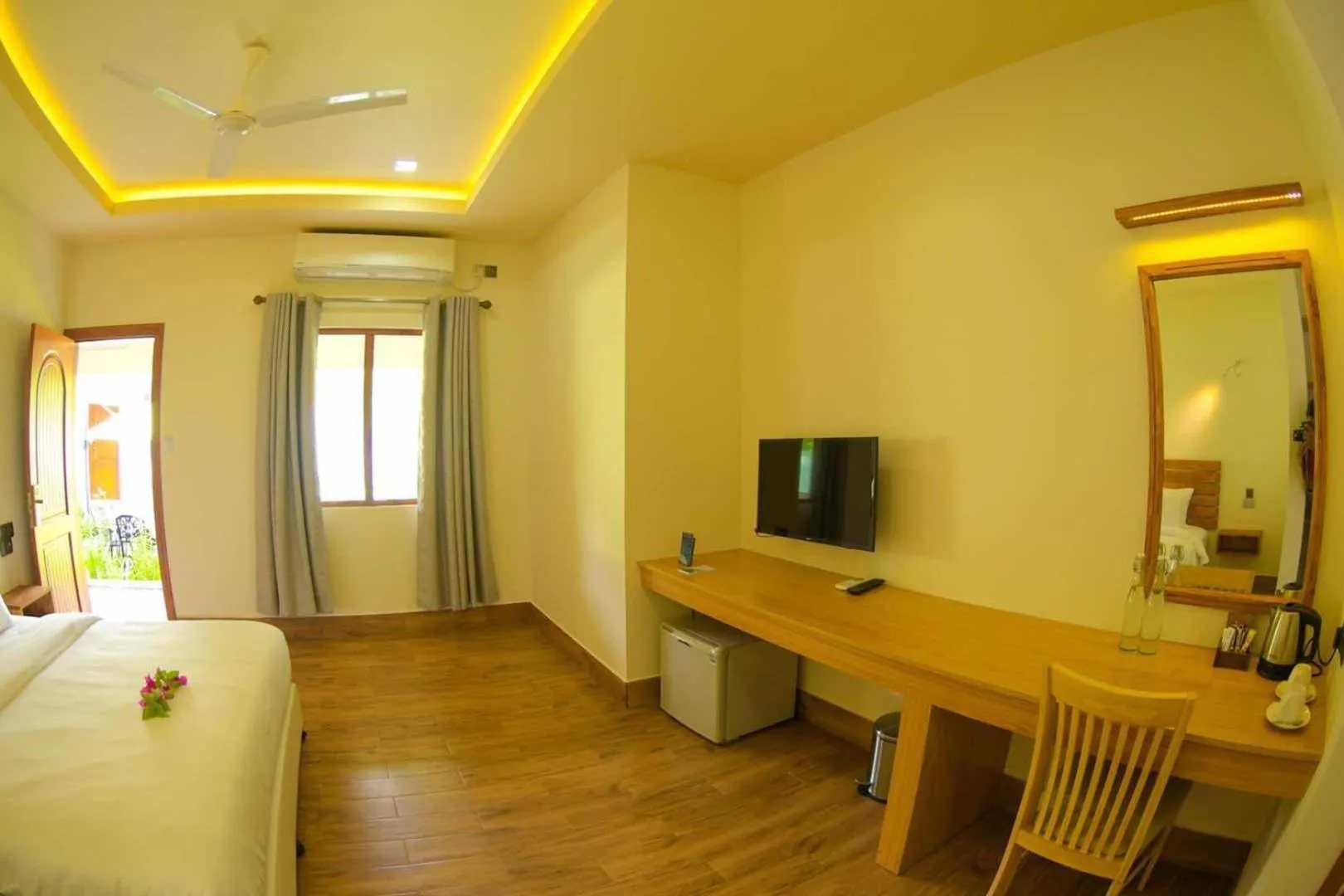 Bed in Tiger Shark Residence & Dive