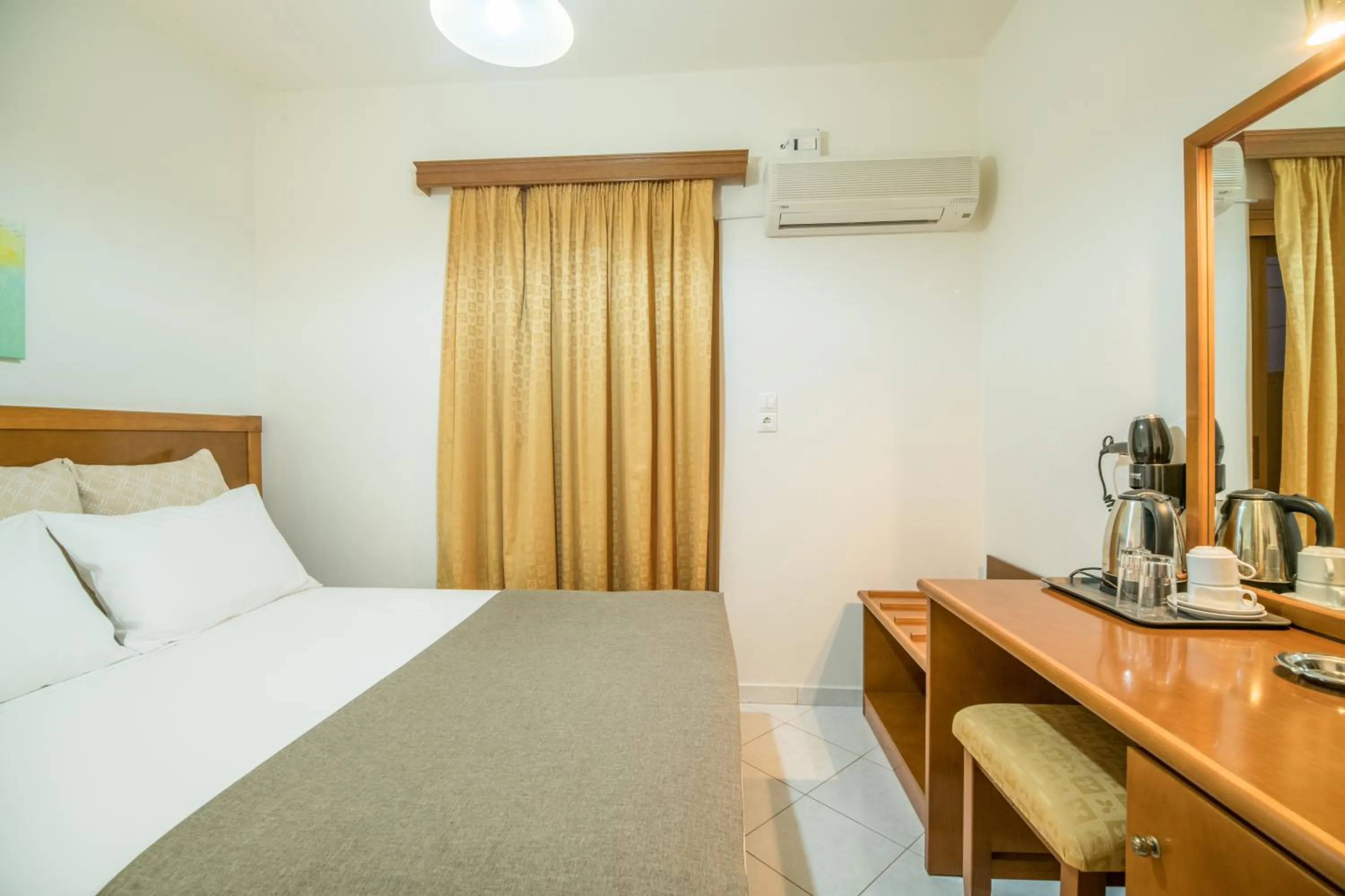 Bed in Hiona Holiday Hotel