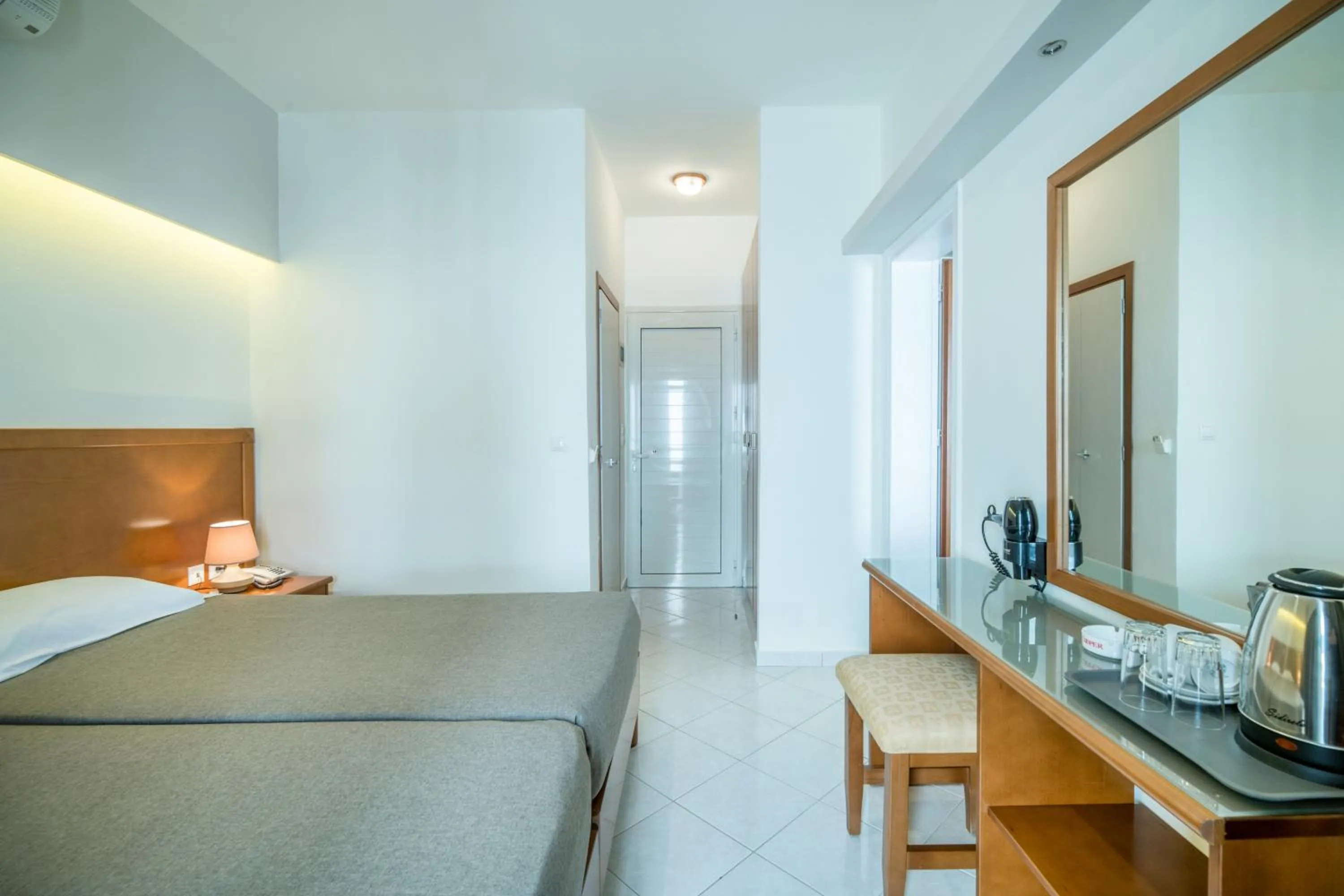 Bed in Hiona Holiday Hotel