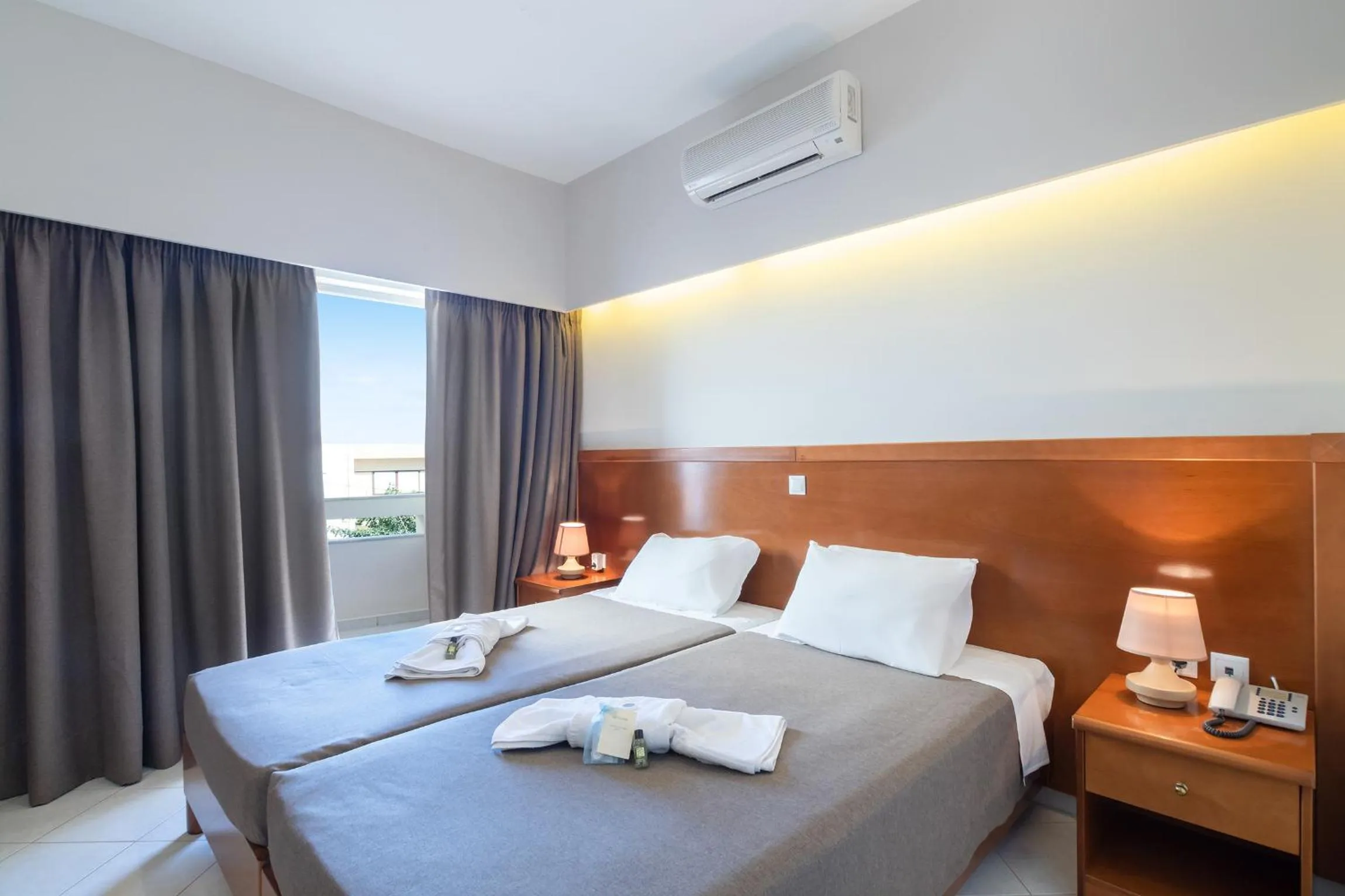 Bed in Hiona Holiday Hotel