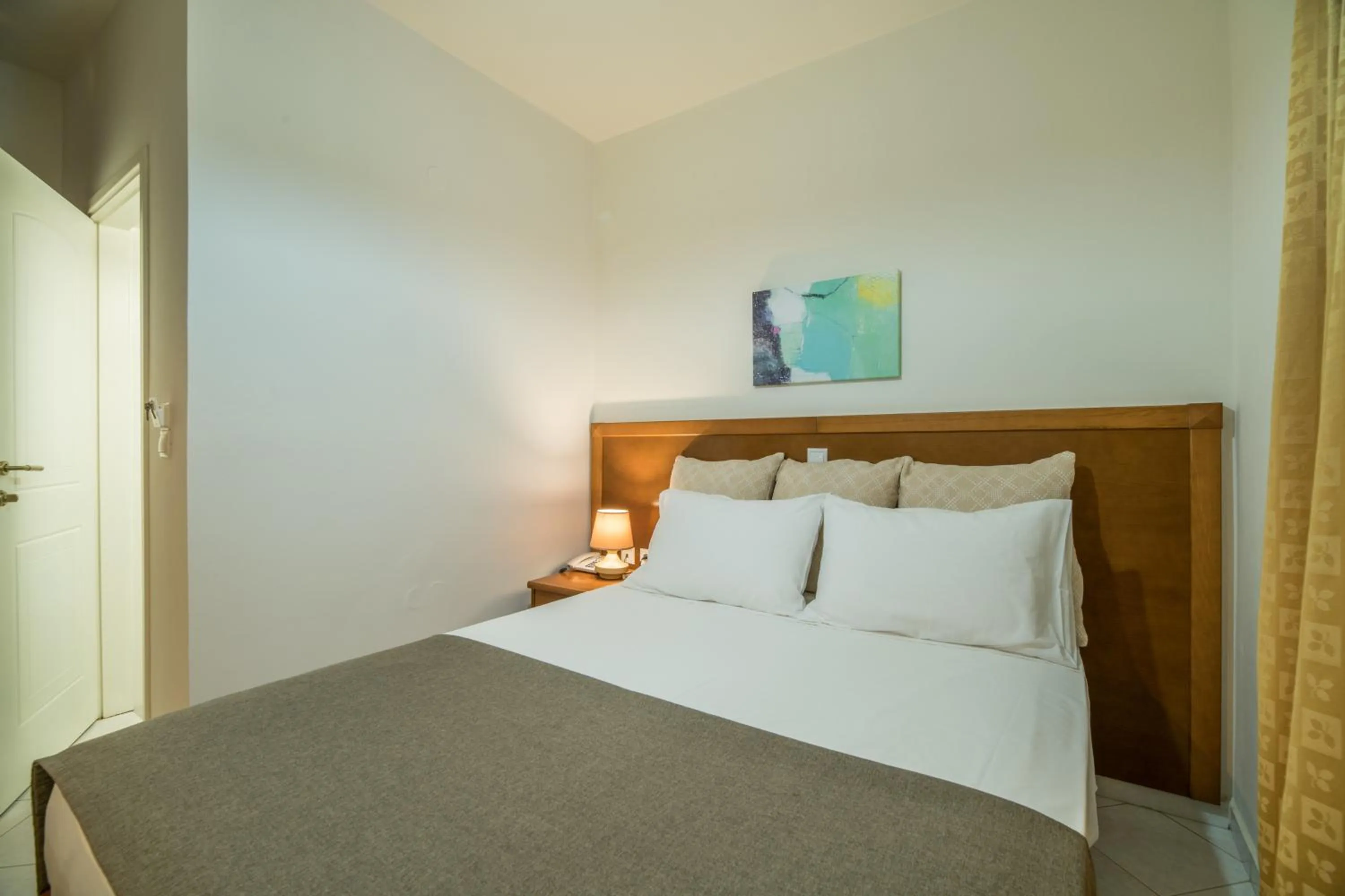 Bed in Hiona Holiday Hotel