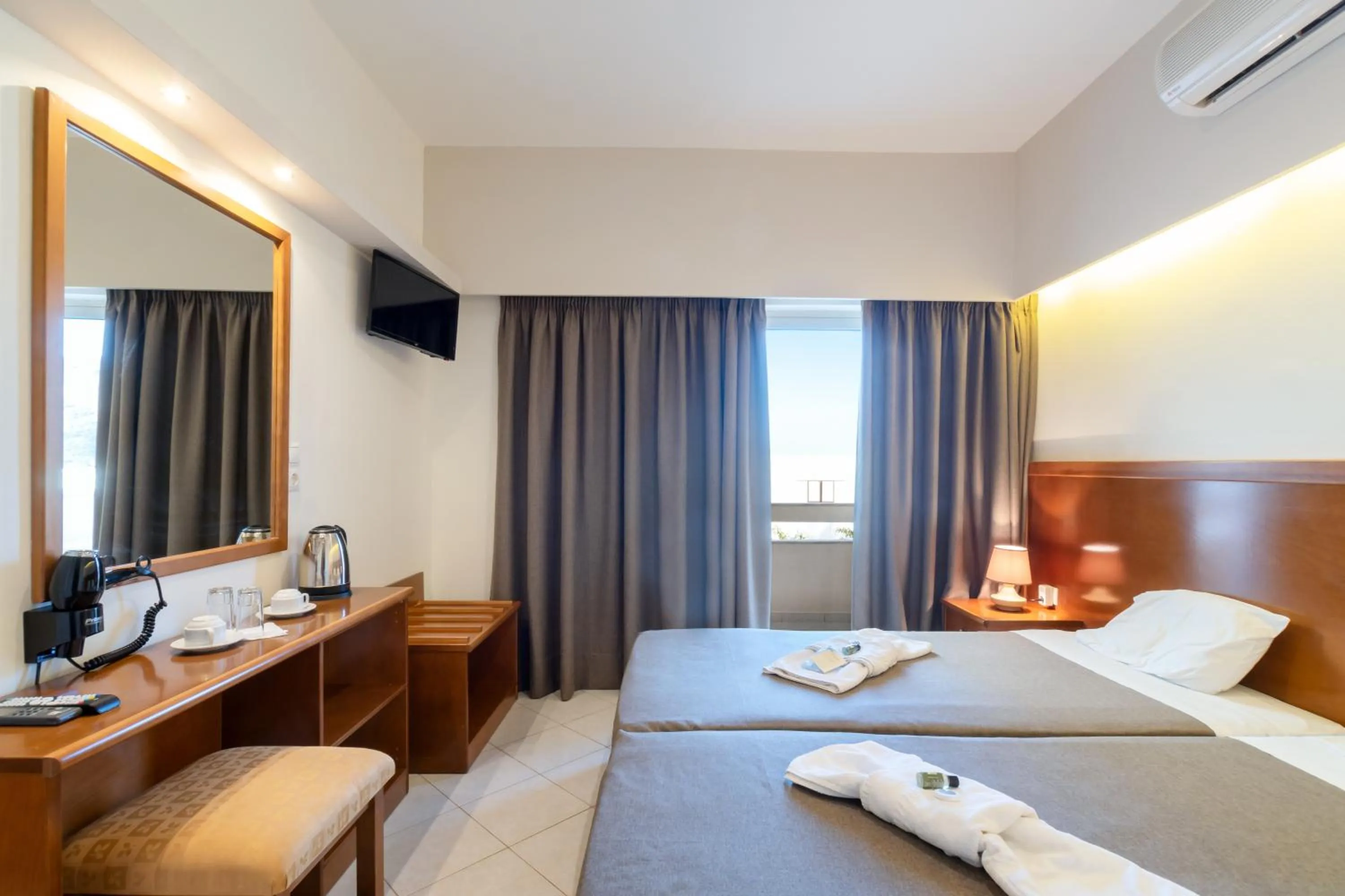 Bed in Hiona Holiday Hotel