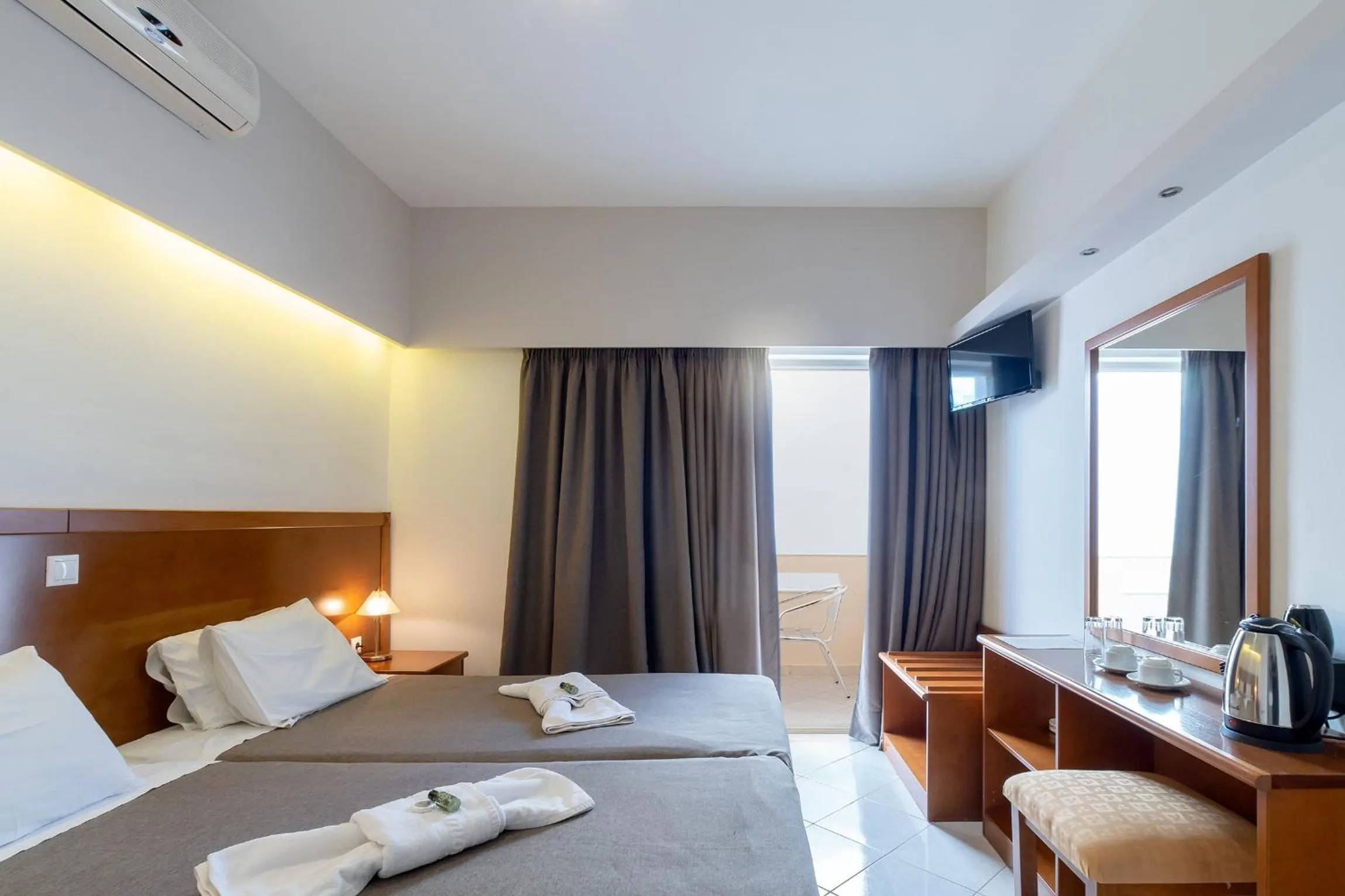 Bed in Hiona Holiday Hotel