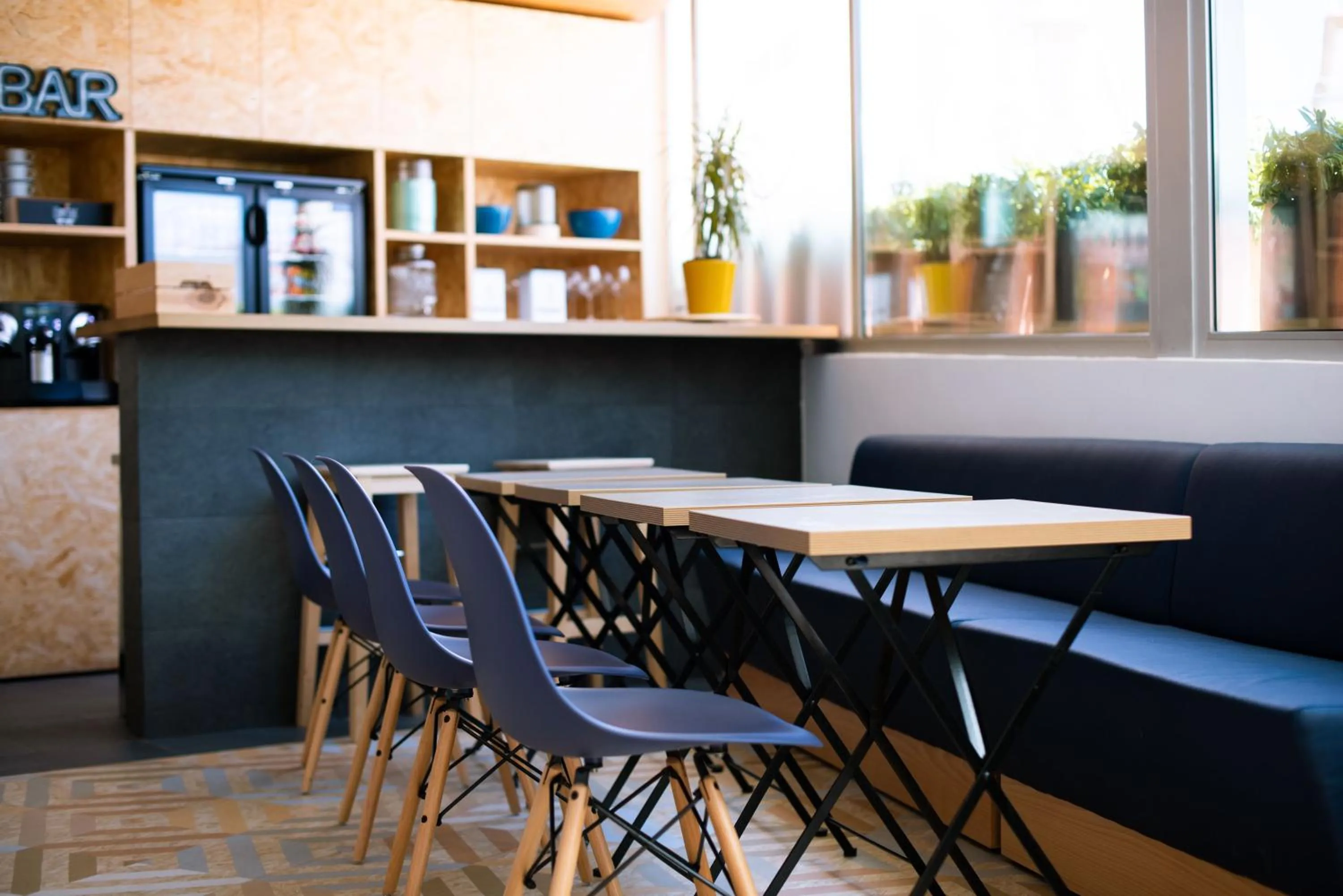 Seating area in TAKE SURF Hostel Conil