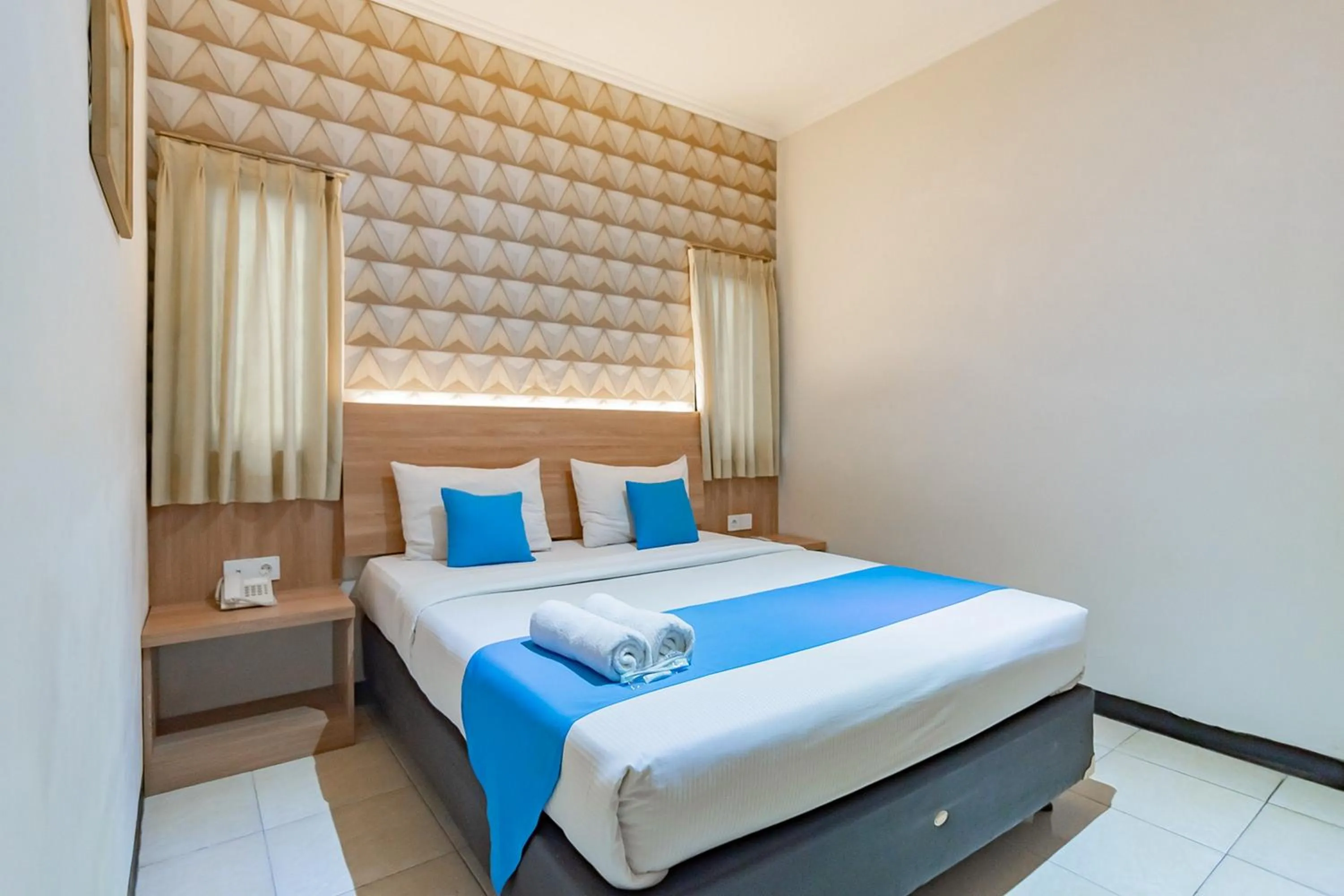 Bed in Cihampelas Hotel 2 Mitra RedDoorz