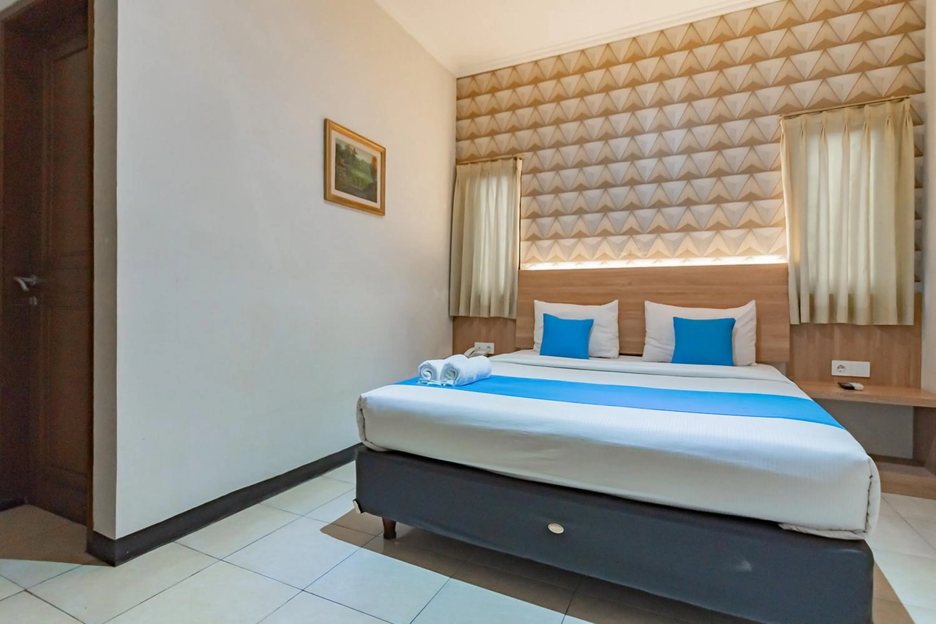 Bed in Cihampelas Hotel 2 Mitra RedDoorz