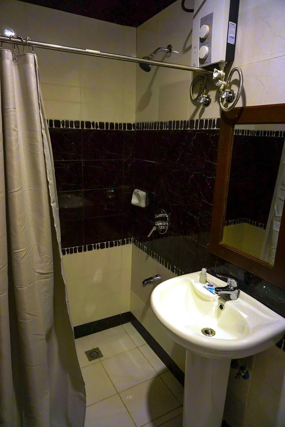 Bathroom in Veranda Suites and Restaurant