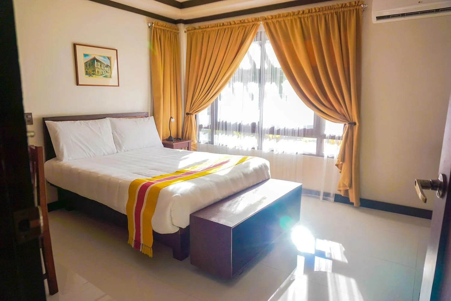Bed in Veranda Suites and Restaurant