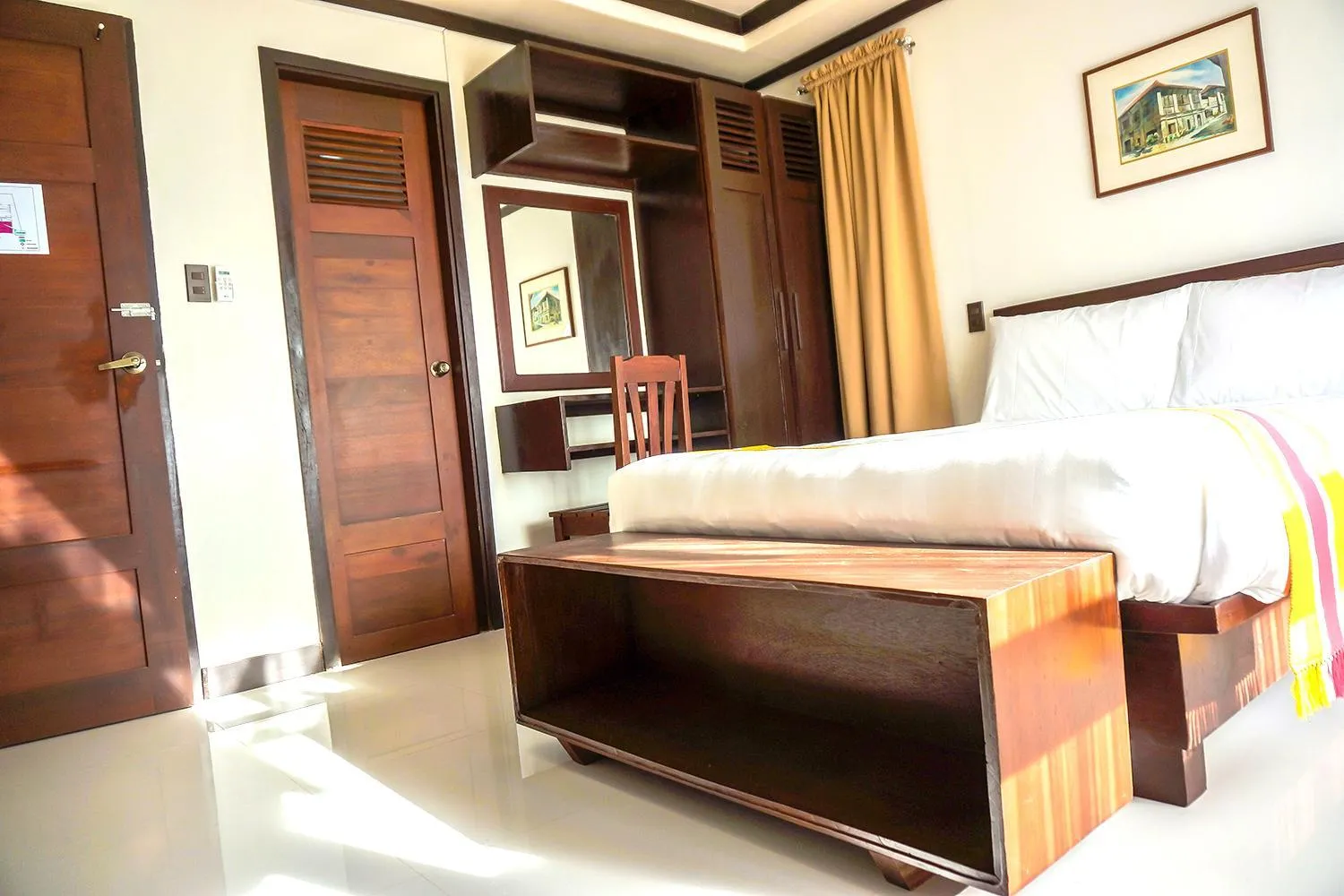 Bed in Veranda Suites and Restaurant