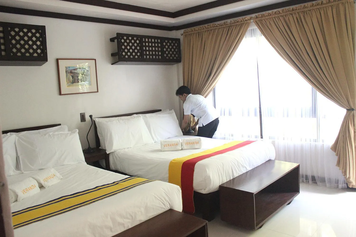 Bed in Veranda Suites and Restaurant