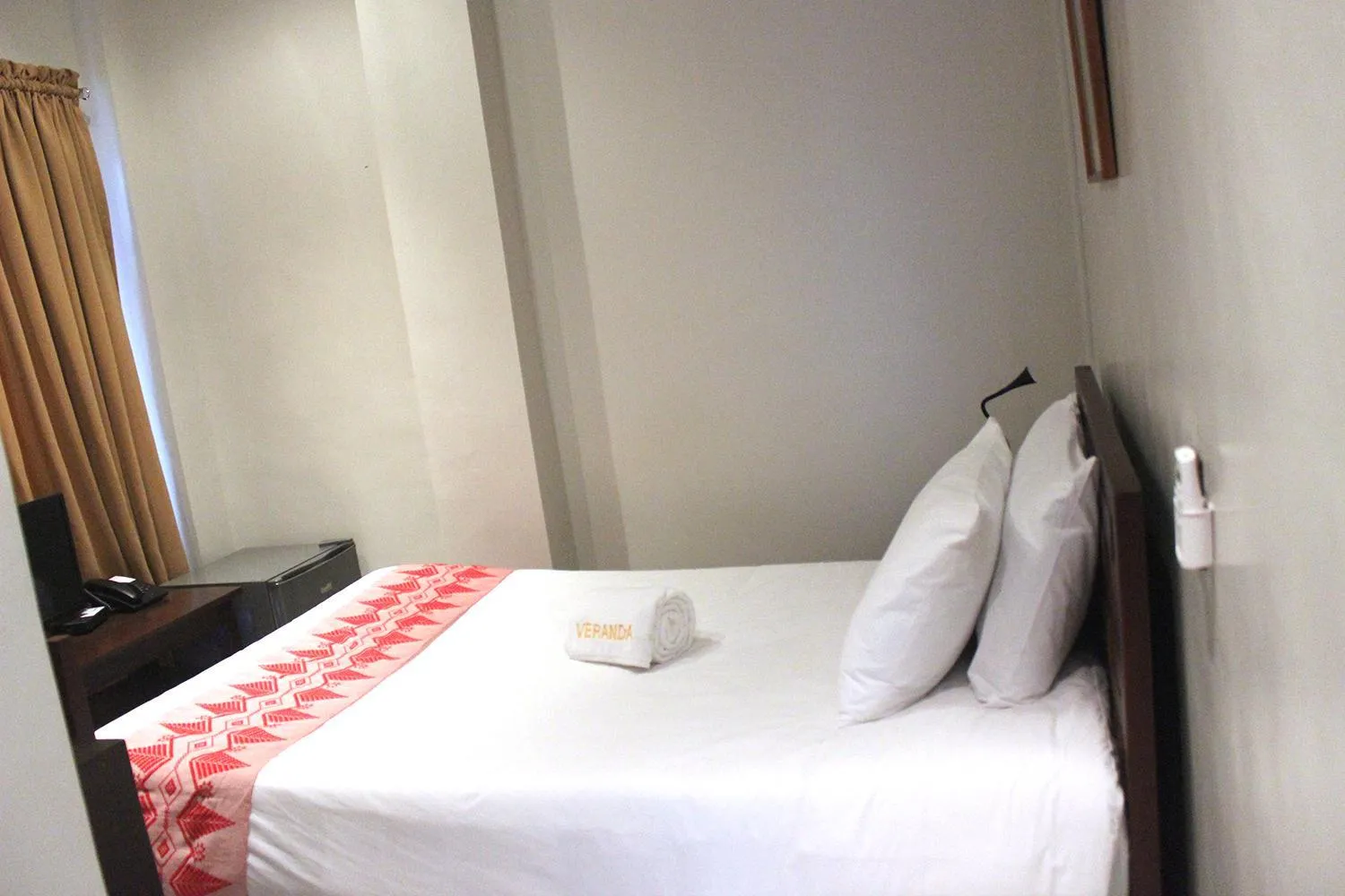 Bed in Veranda Suites and Restaurant