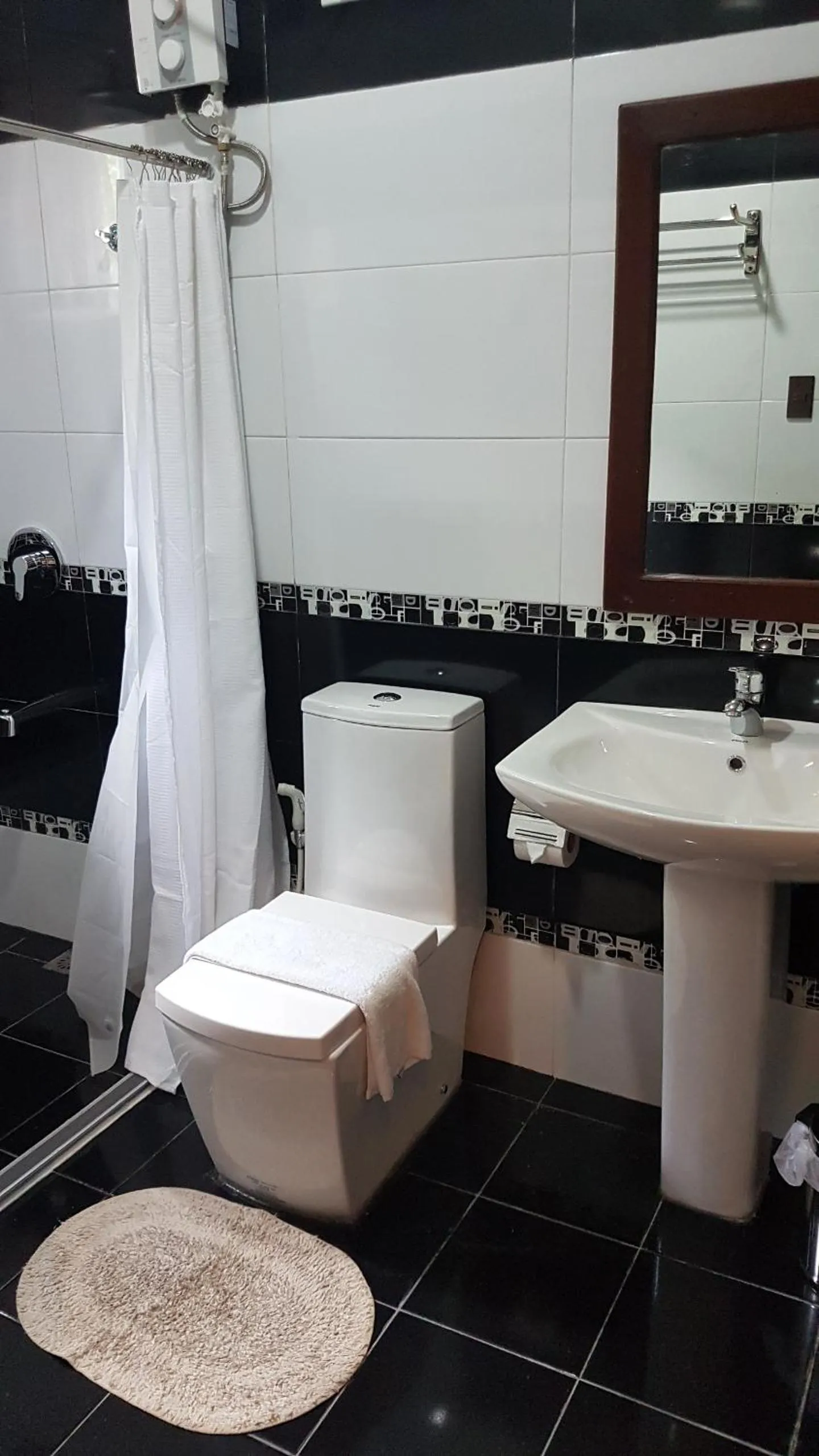 Bathroom in Veranda Suites and Restaurant