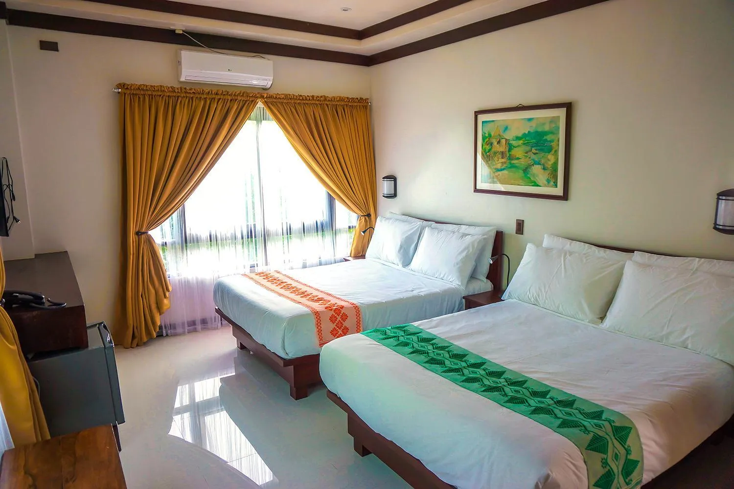 Bed in Veranda Suites and Restaurant