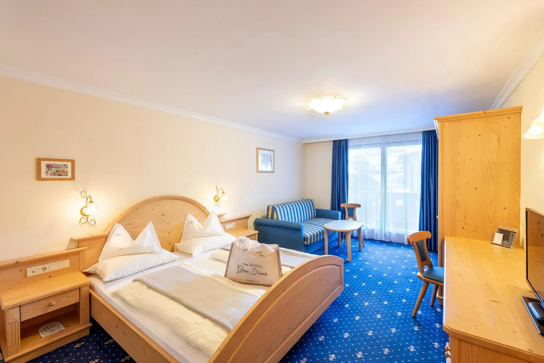 Deluxe Quadruple Room in Hotel Gran Fanes Deluxe Quadruple Room in Hotel Gran Fanes