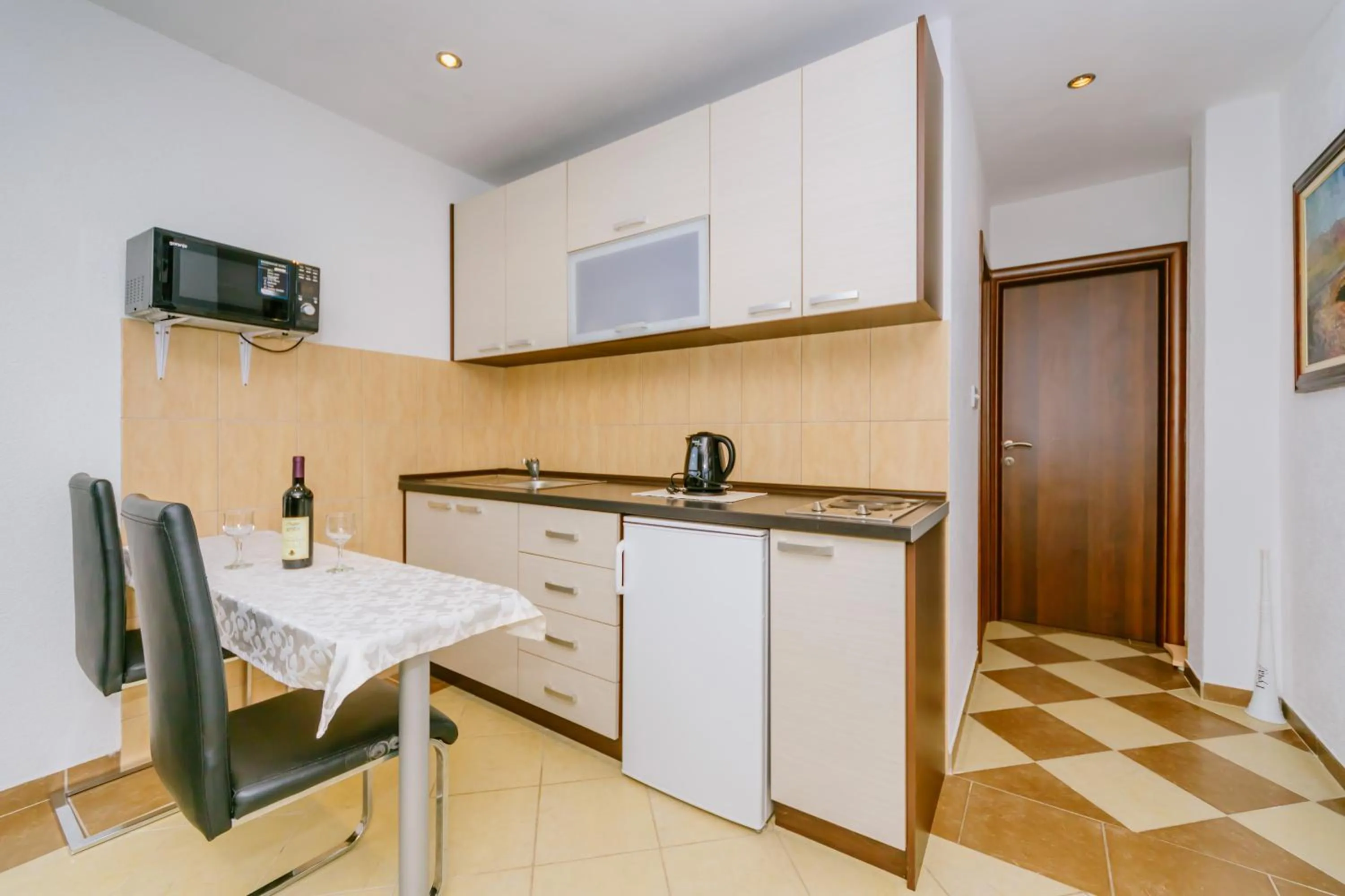 Kitchen or kitchenette in Apartmani Novaković