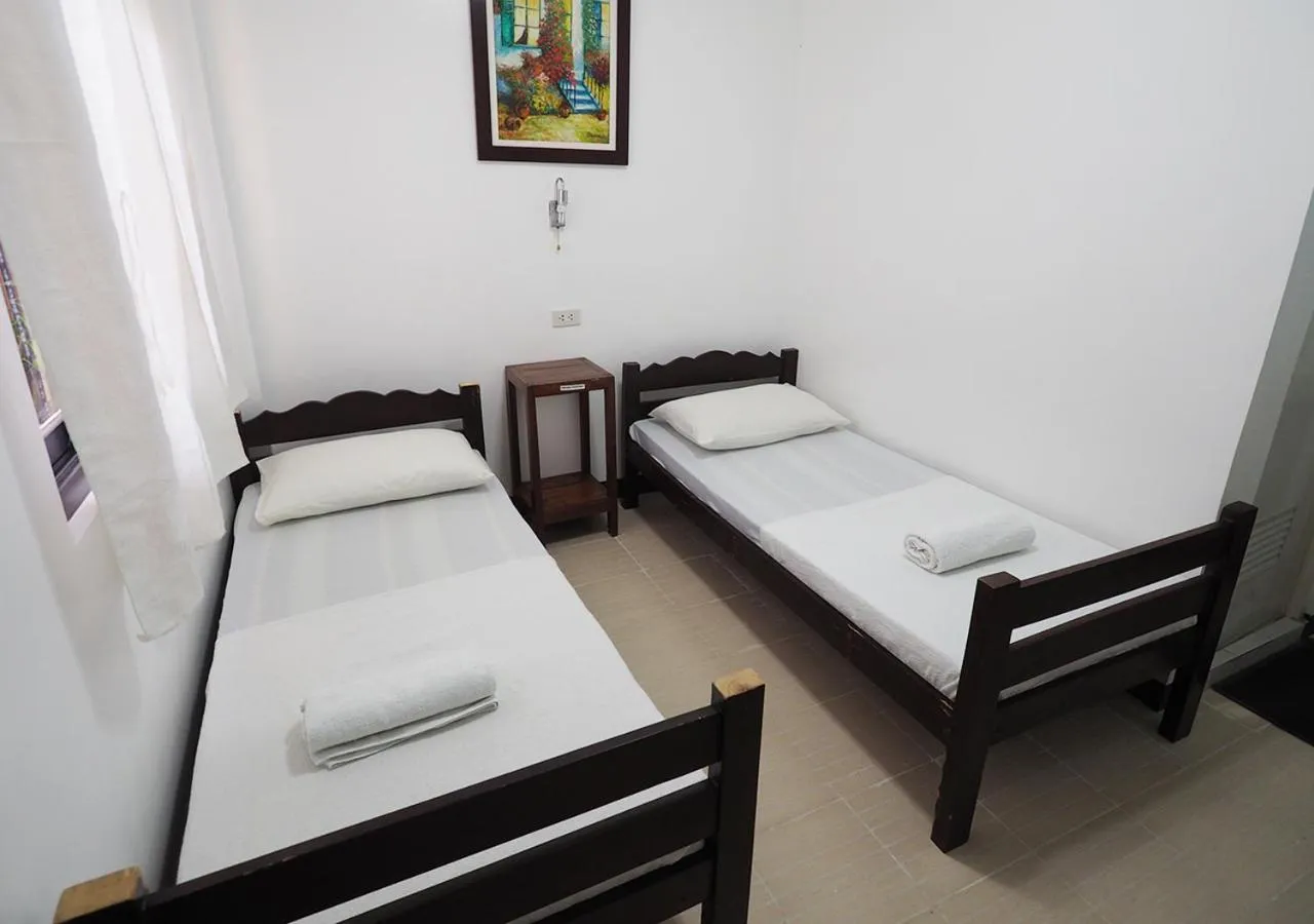 Bed in Balay Travel Lodge