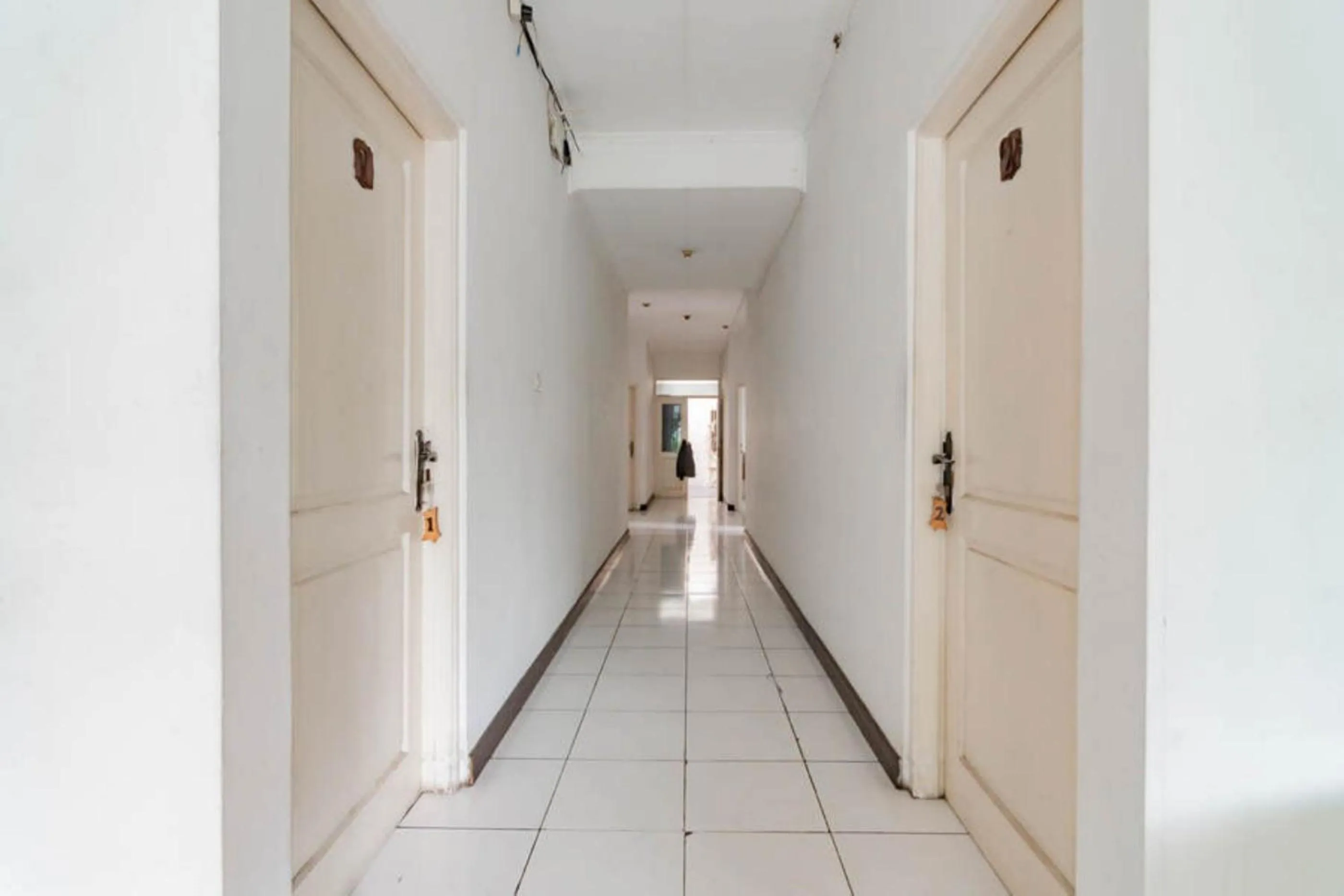 Bedroom in Pall Inn Puncak Mitra RedDoorz