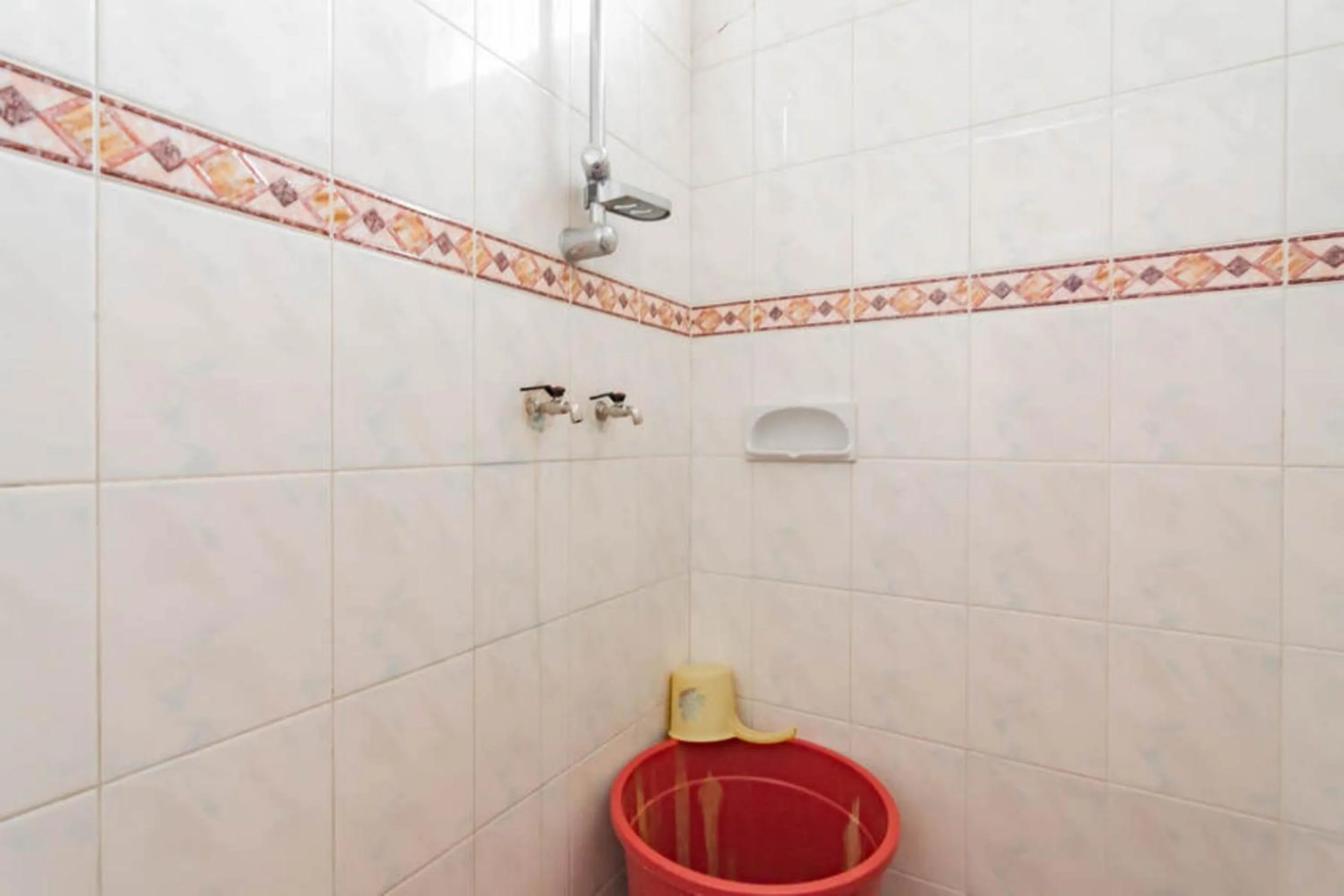 Bathroom in Pall Inn Puncak Mitra RedDoorz