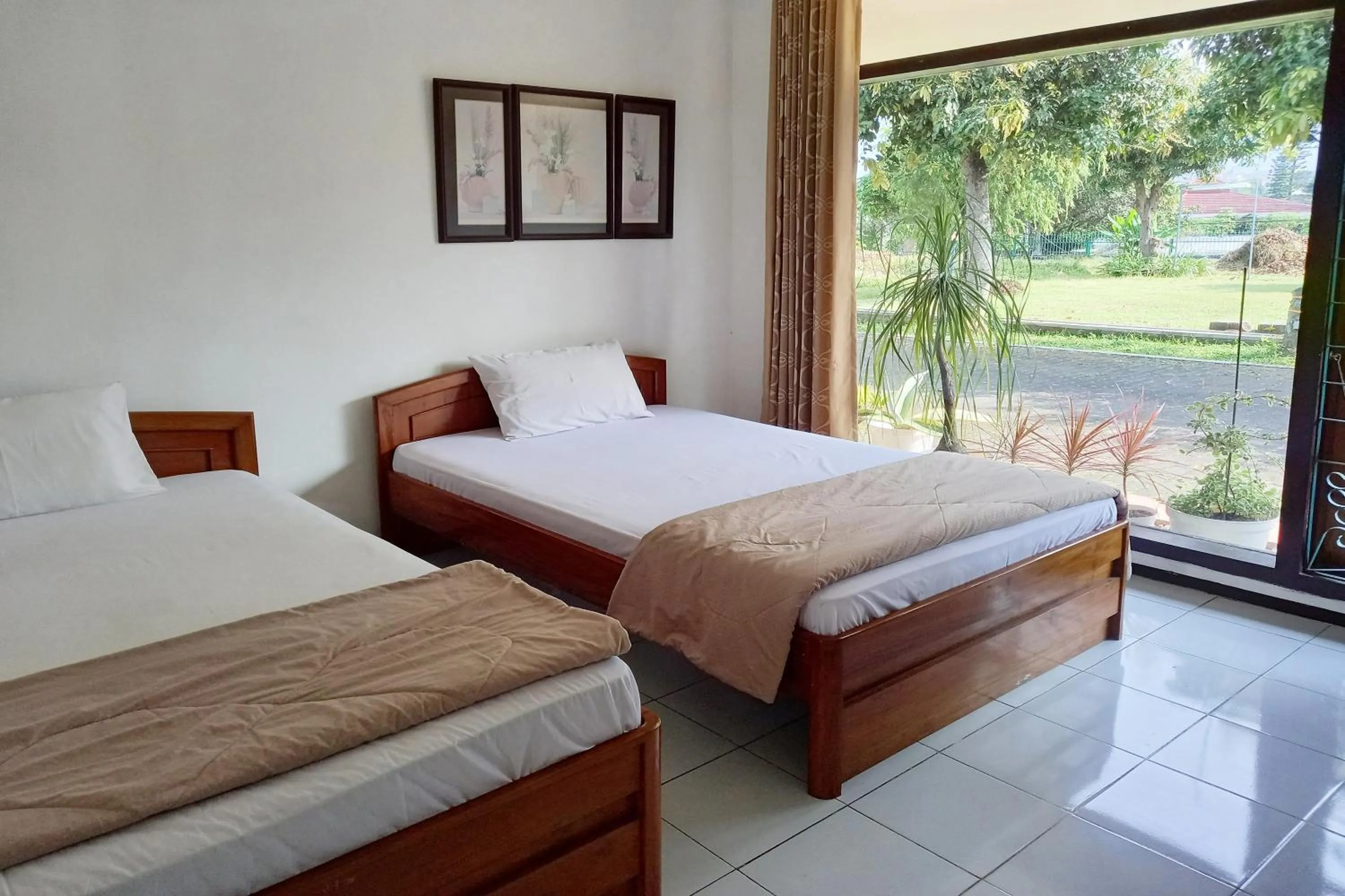 Bed in Vanda Villa Batu
