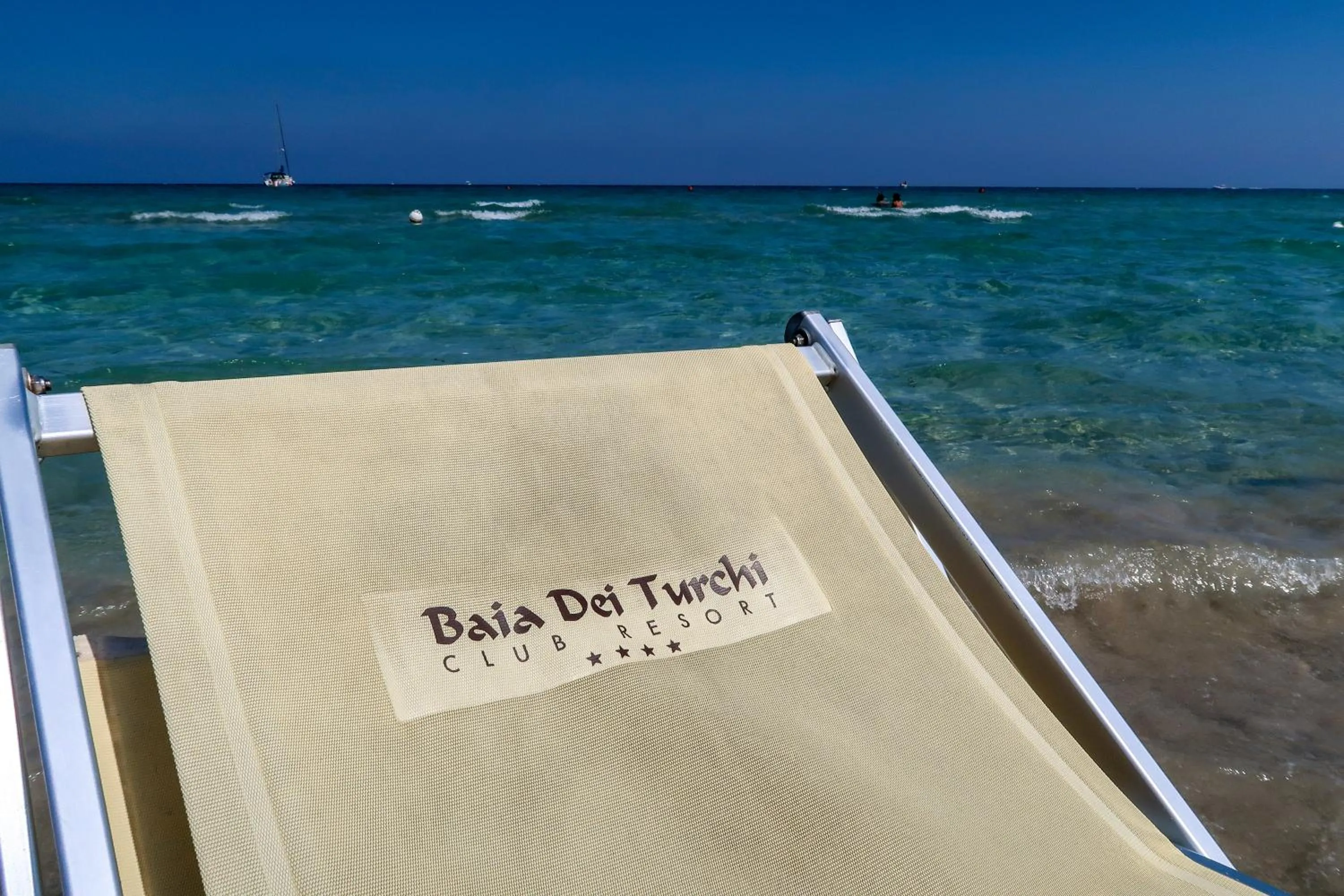 Beach in Amareclub Baia Dei Turchi Resort - Adults Only