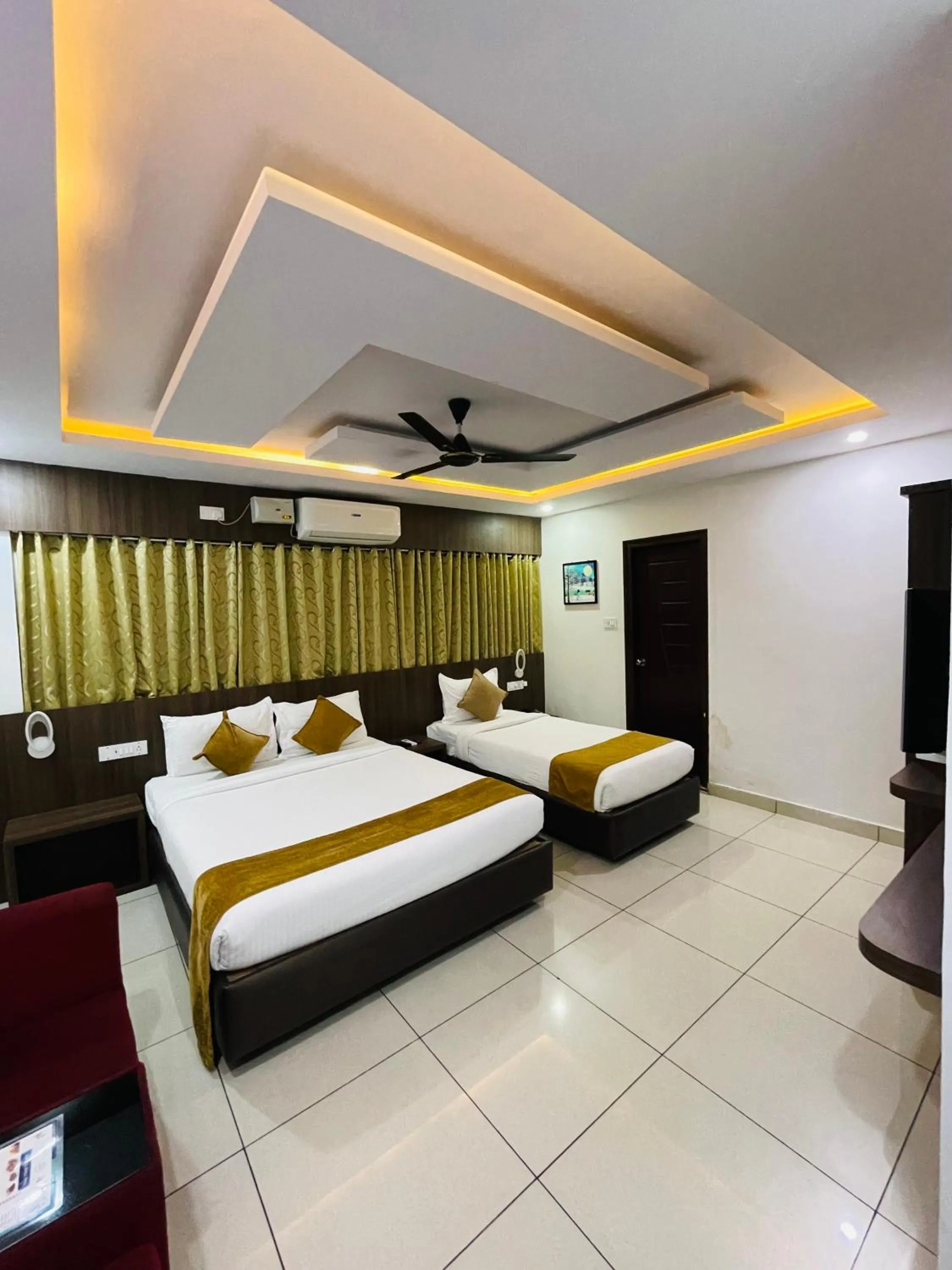 Photo of the whole room, Bed in The Porch Inn Hotel & Service Apartments Near Nimhans Hospital